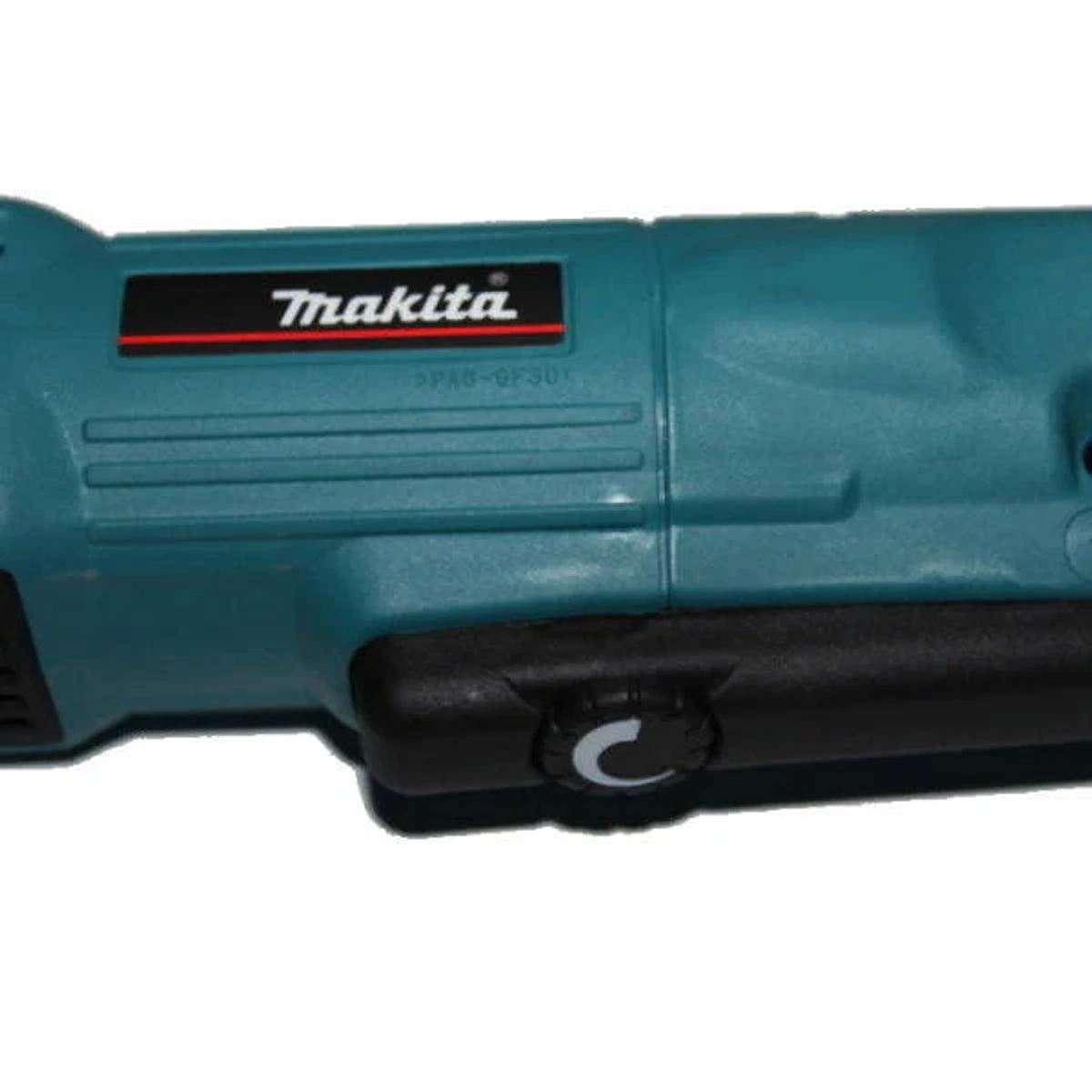 Primer plano de una herramienta eléctrica Makita verde azulado, con base negra y logotipo Makita visible.