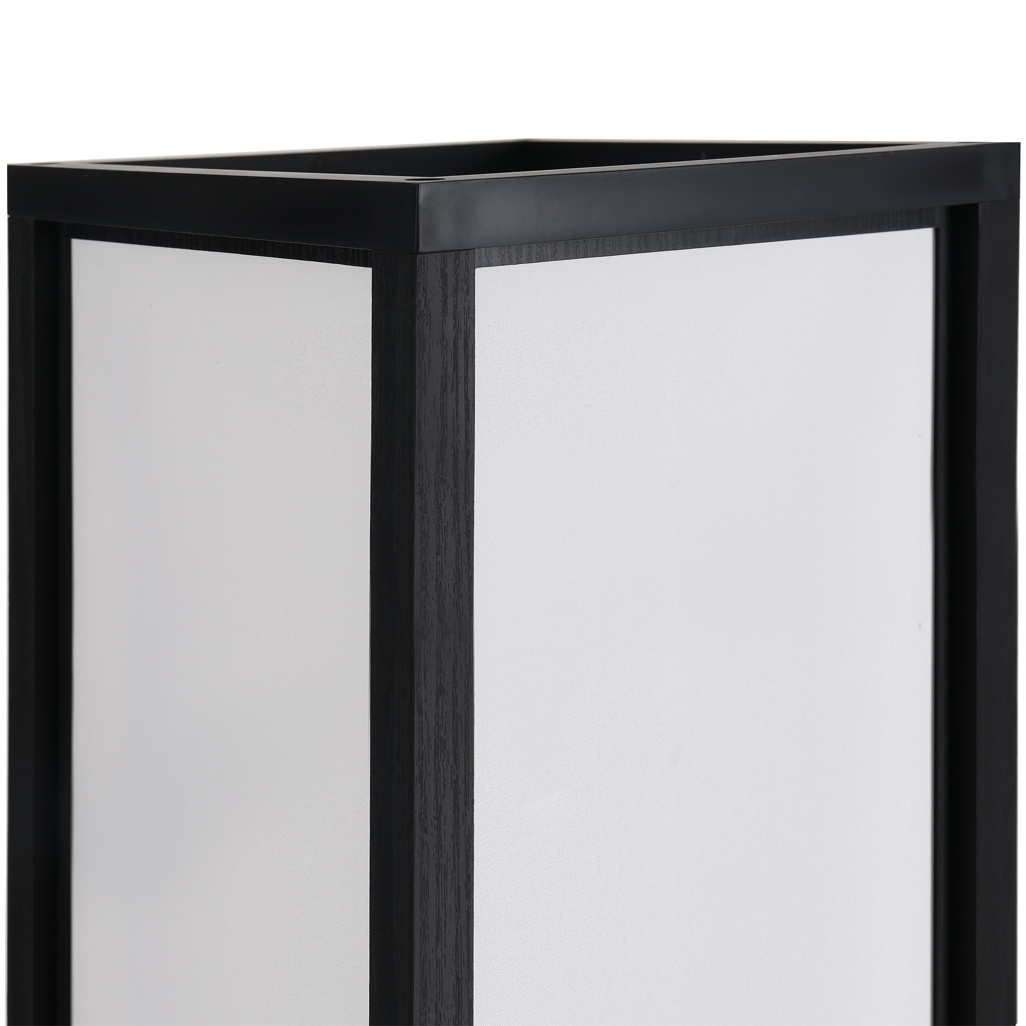 Primo piano di un pannello con cornice nera e inserti bianchi, design moderno.