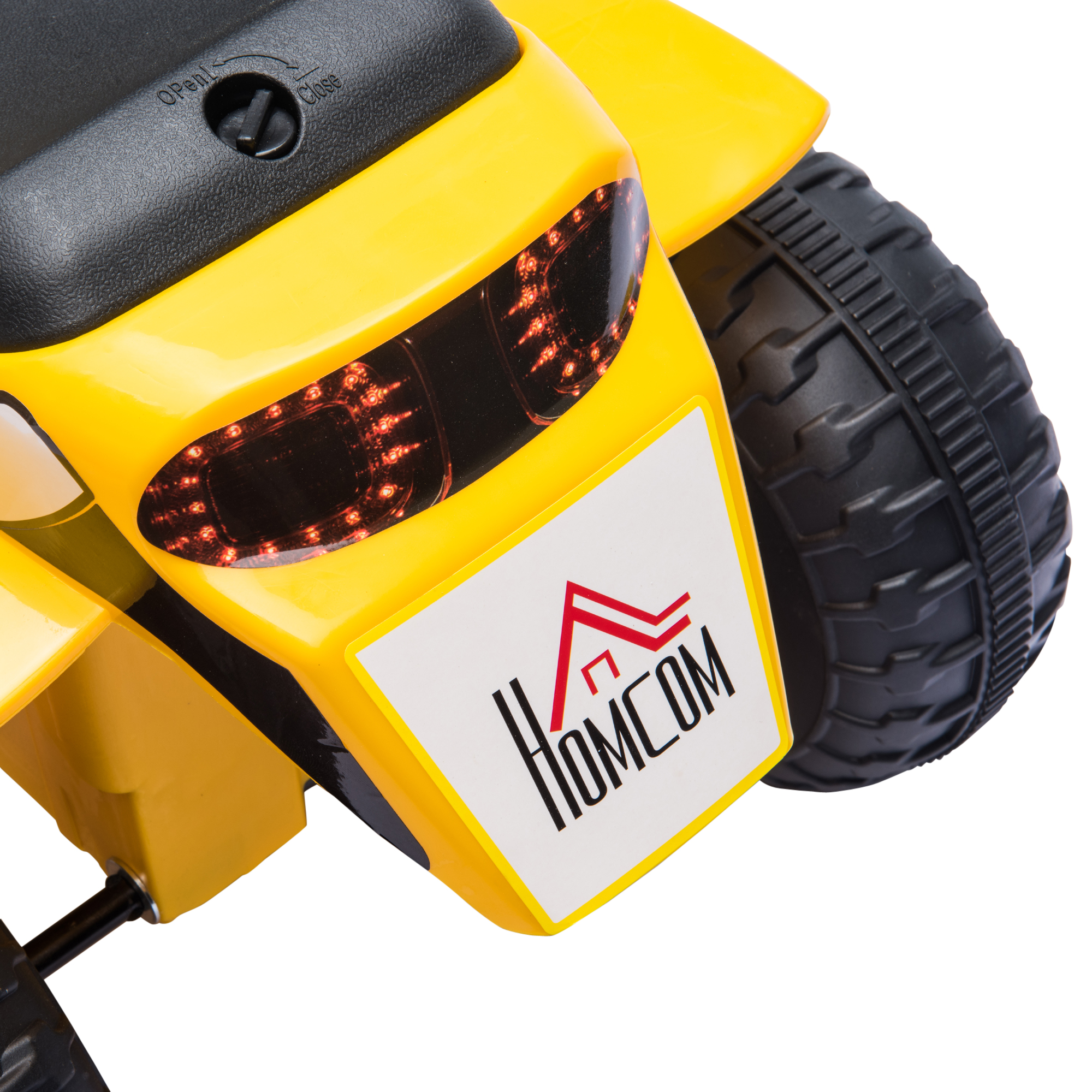 Veicolo giocattolo giallo con logo HOMCOM sulla parte anteriore. Pneumatici neri e luci rosse.