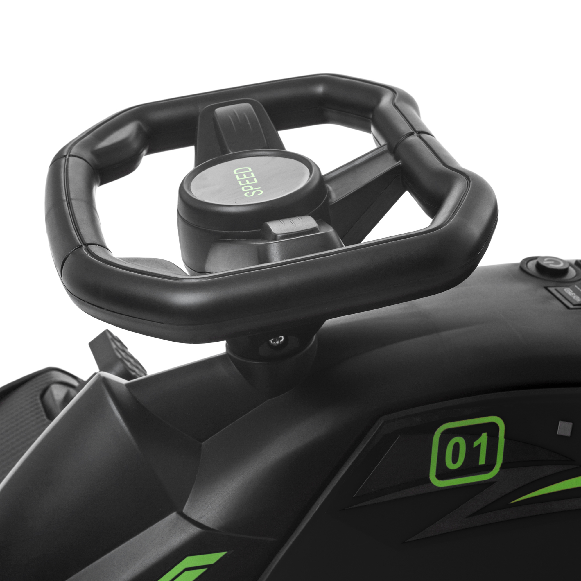Volante nero con quadrante centrale Speed, su un giocattolo nero simile a un'auto.