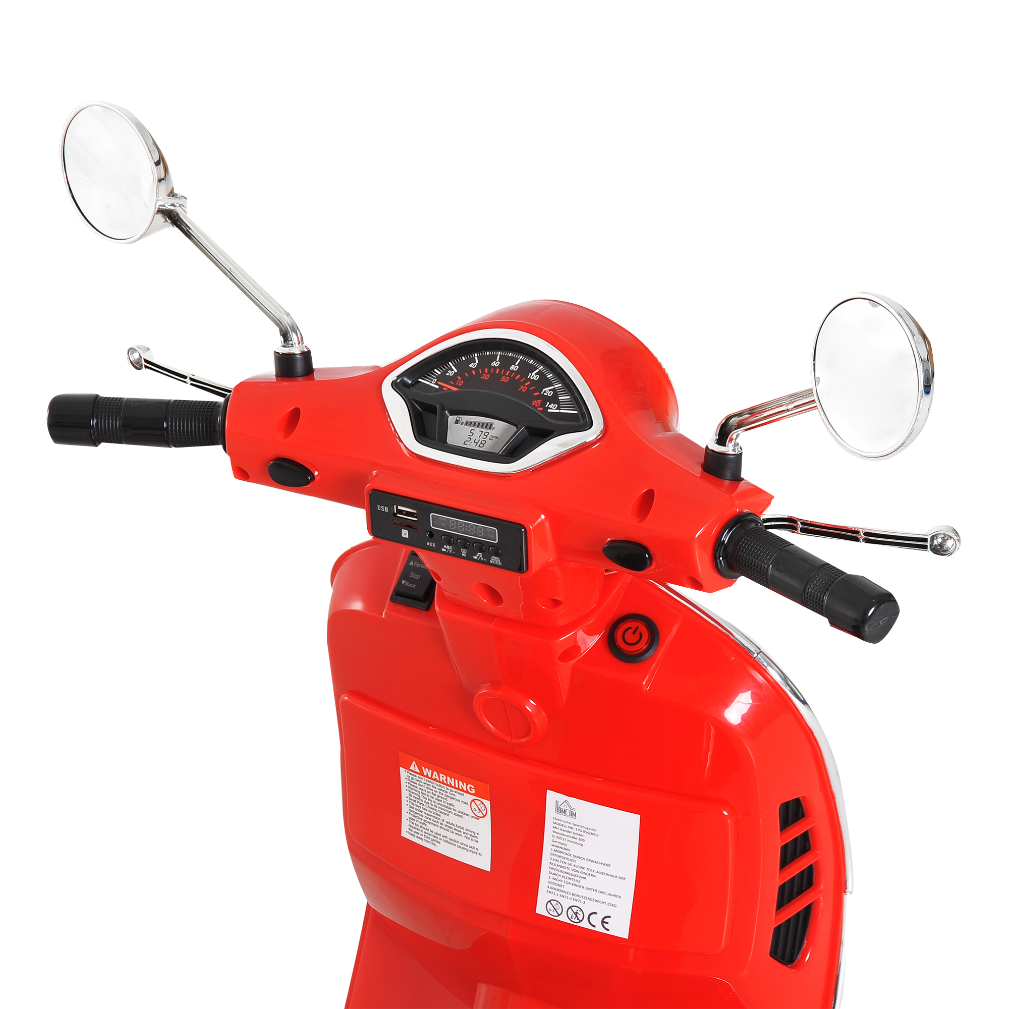 Primo piano del cruscotto di uno scooter giocattolo rosso con tachimetro e specchietti.