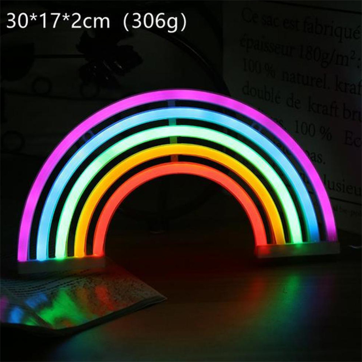 Regenbogenförmige Neonleuchte. Mehrfarbige Bögen. Auf dunkler Oberfläche, strahlt.