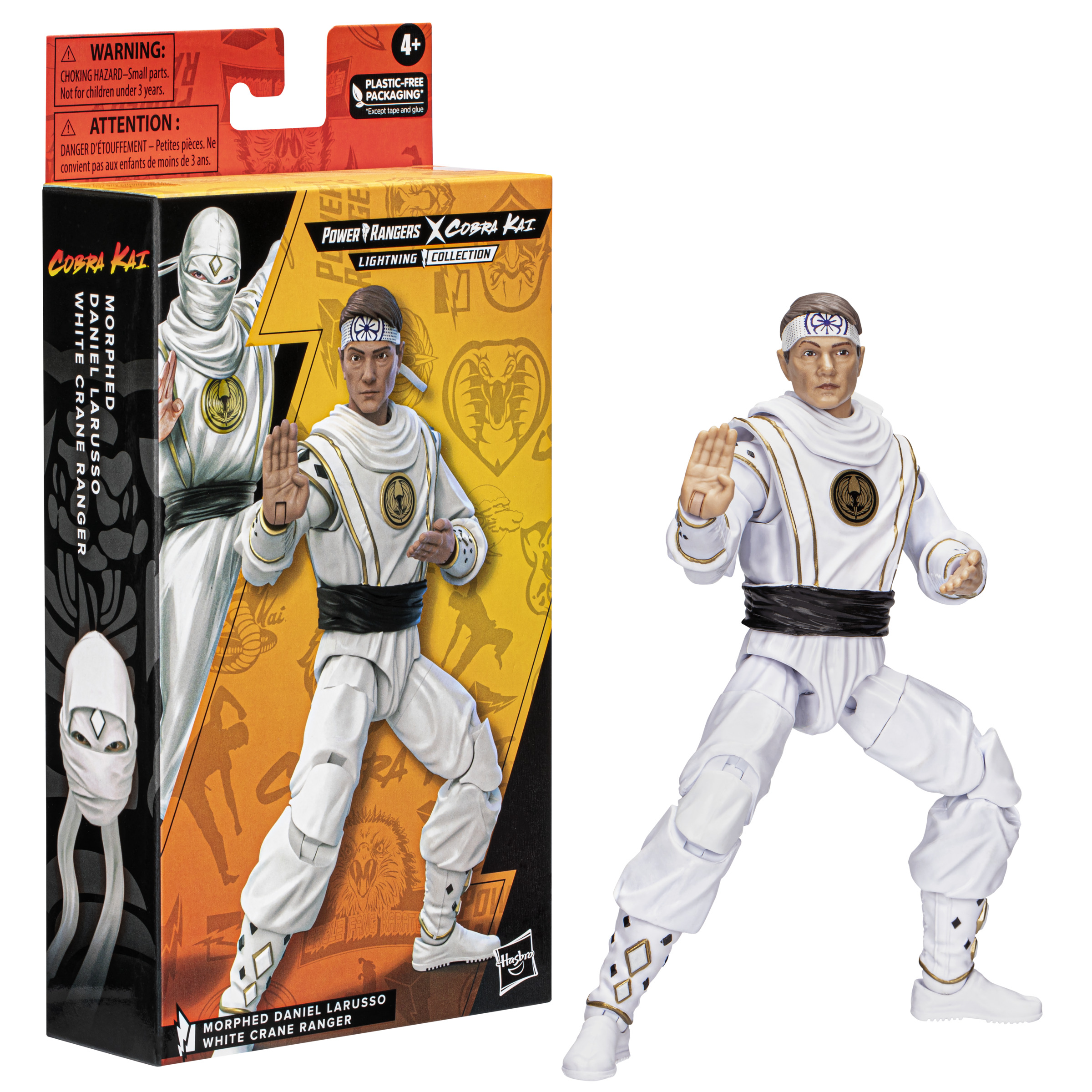 Action figure di un Power Ranger vestito di bianco, in una scatola. La scatola ha un'immagine.