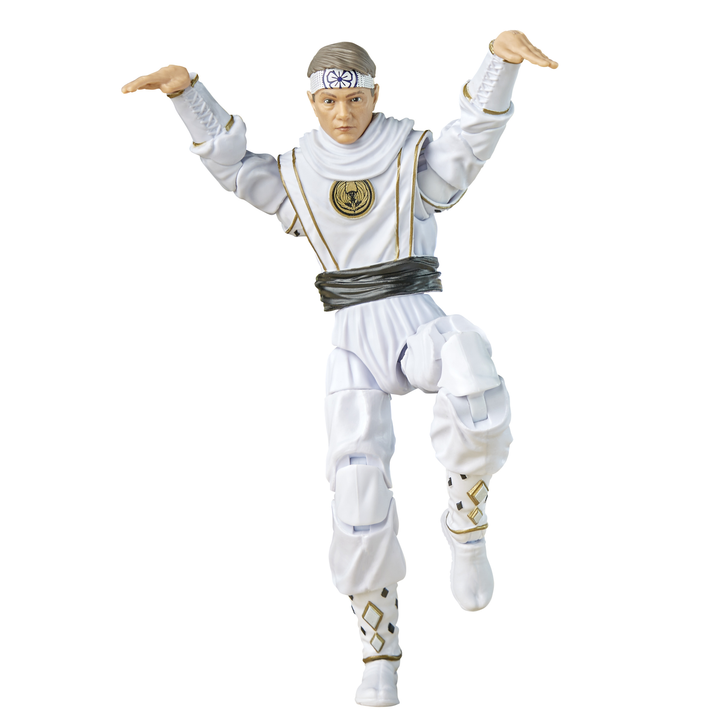 Action figure in abito bianco. Posa di karate. Sfondo bianco.
