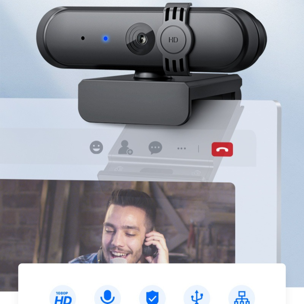 Schwarze Webcam oben auf einem Laptop-Bildschirm. Ein Mann ist in einem Videoanruf. Symbole unten.