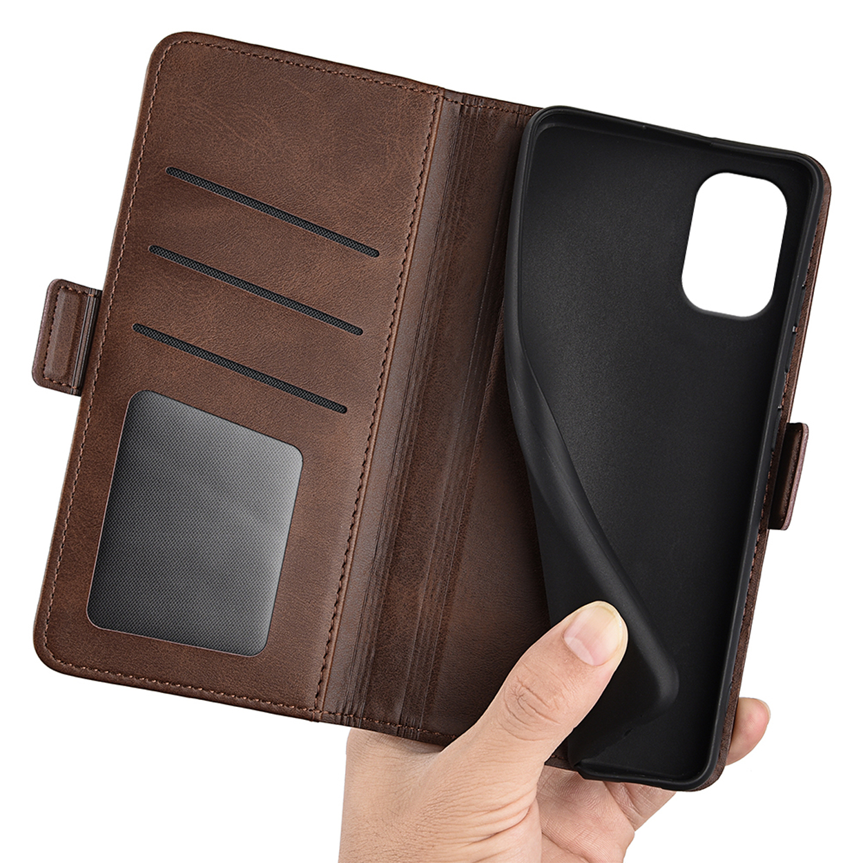 Bruine leren portemonneehoes, open, met zwarte telefoonhoes. Bruin interieur.
