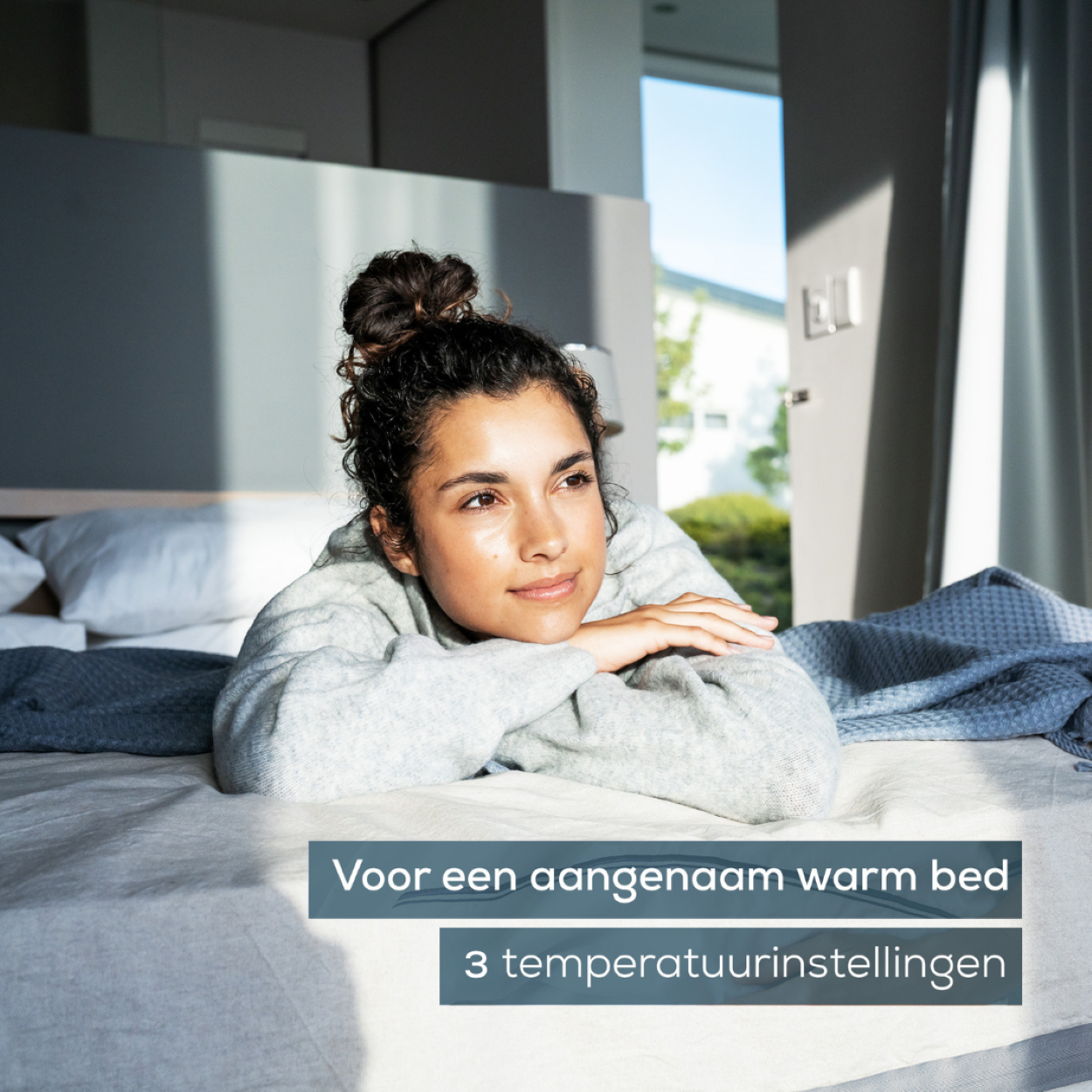 Donna a letto che guarda altrove, con testo su 3 impostazioni di temperatura.