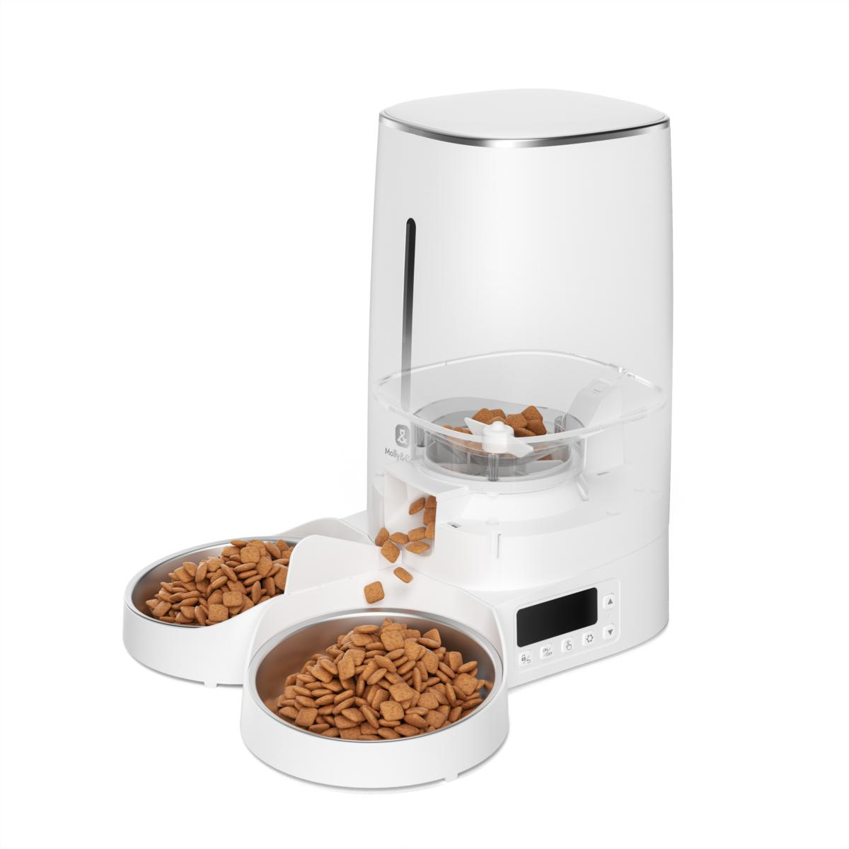 Erogatore di cibo per animali domestici bianco con contenitore trasparente, due ciotole e pannello di controllo digitale.