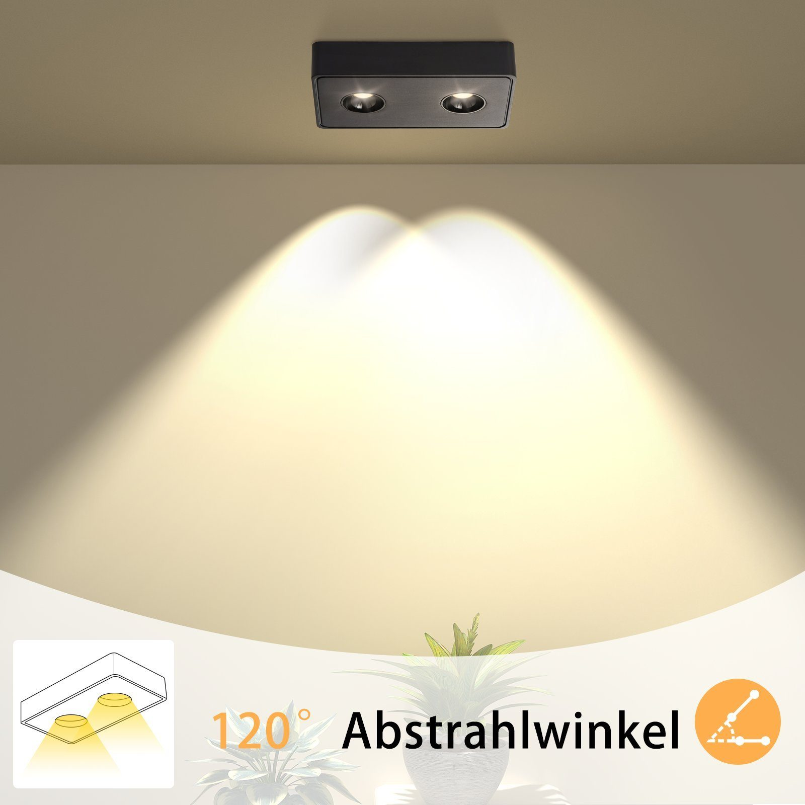 Una luce da soffitto nera con due luci emette luce verso il basso.