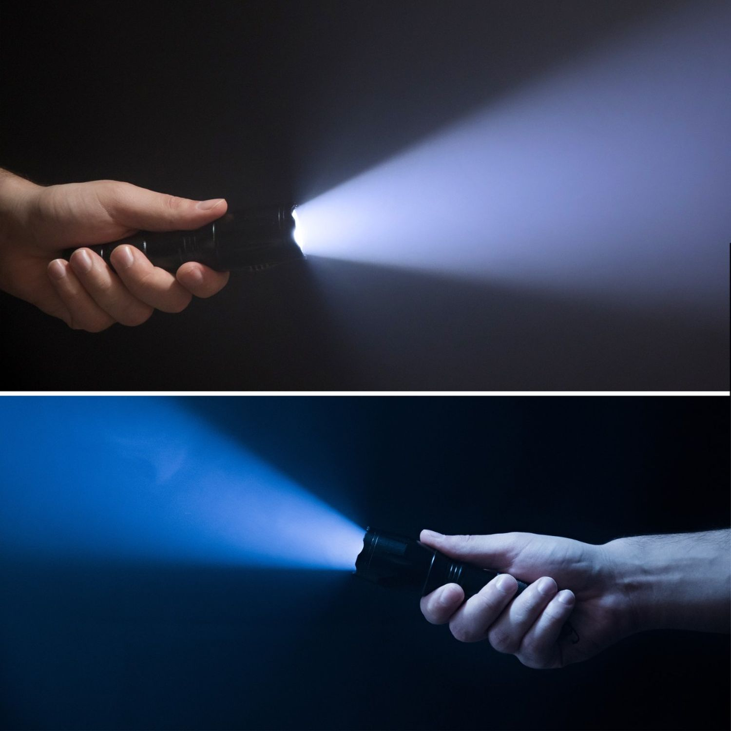 Hände, die Taschenlampen halten. Ein Strahl ist weiß und der andere blau.