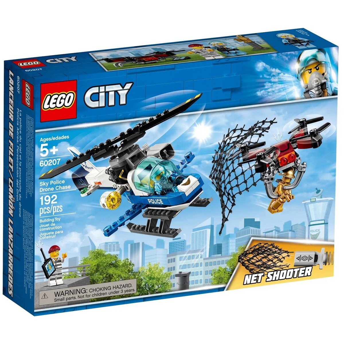 Pudełko zestawu LEGO City z policyjnym helikopterem, wyrzutnią siatki i minifigurką.