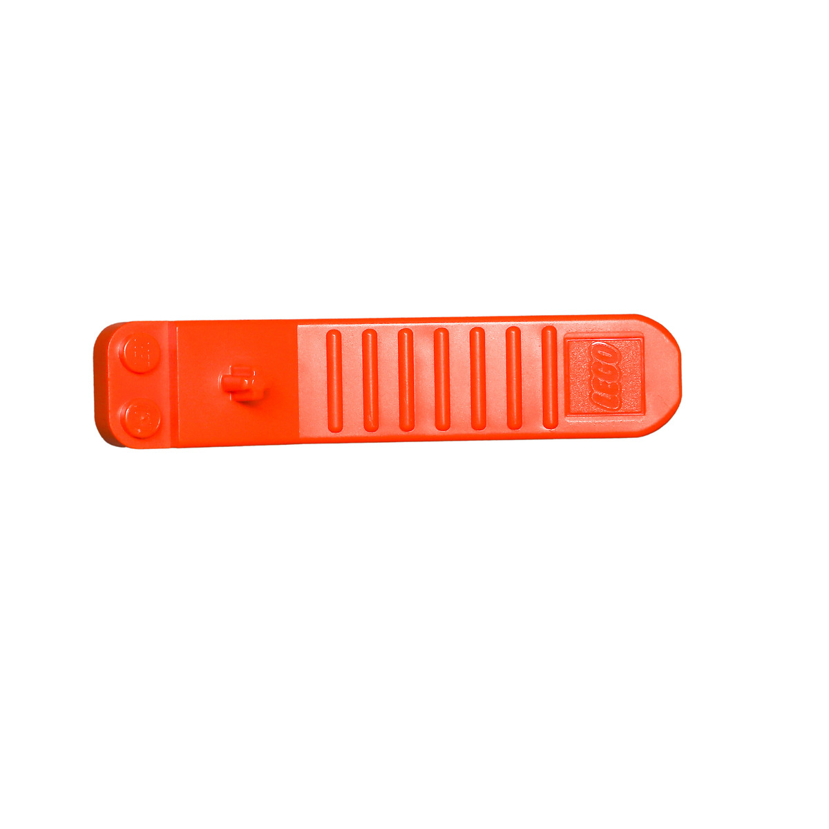 Un separatore di mattoncini Lego arancione su una superficie bianca, con il logo Lego visibile.
