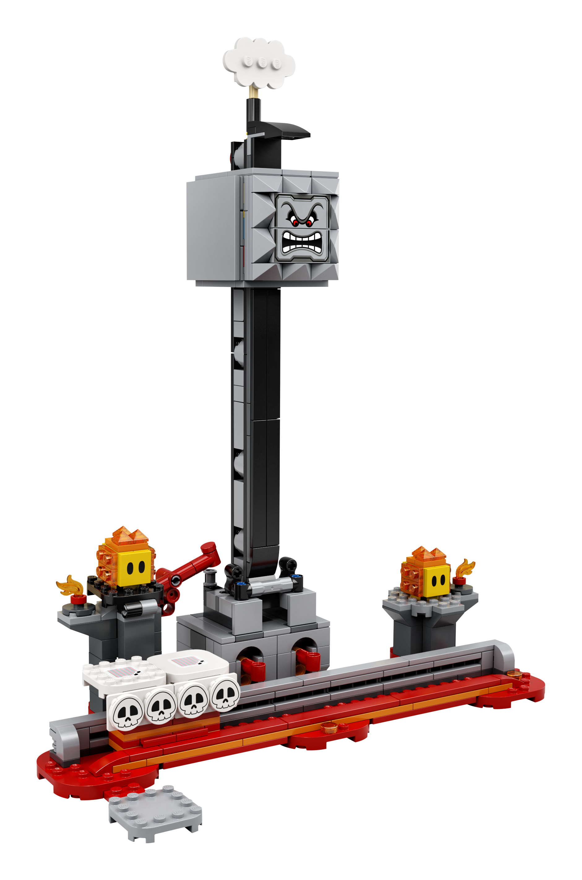 Un set Lego con una grande struttura con la faccia arrabbiata e una pista rotolante con fuoco.