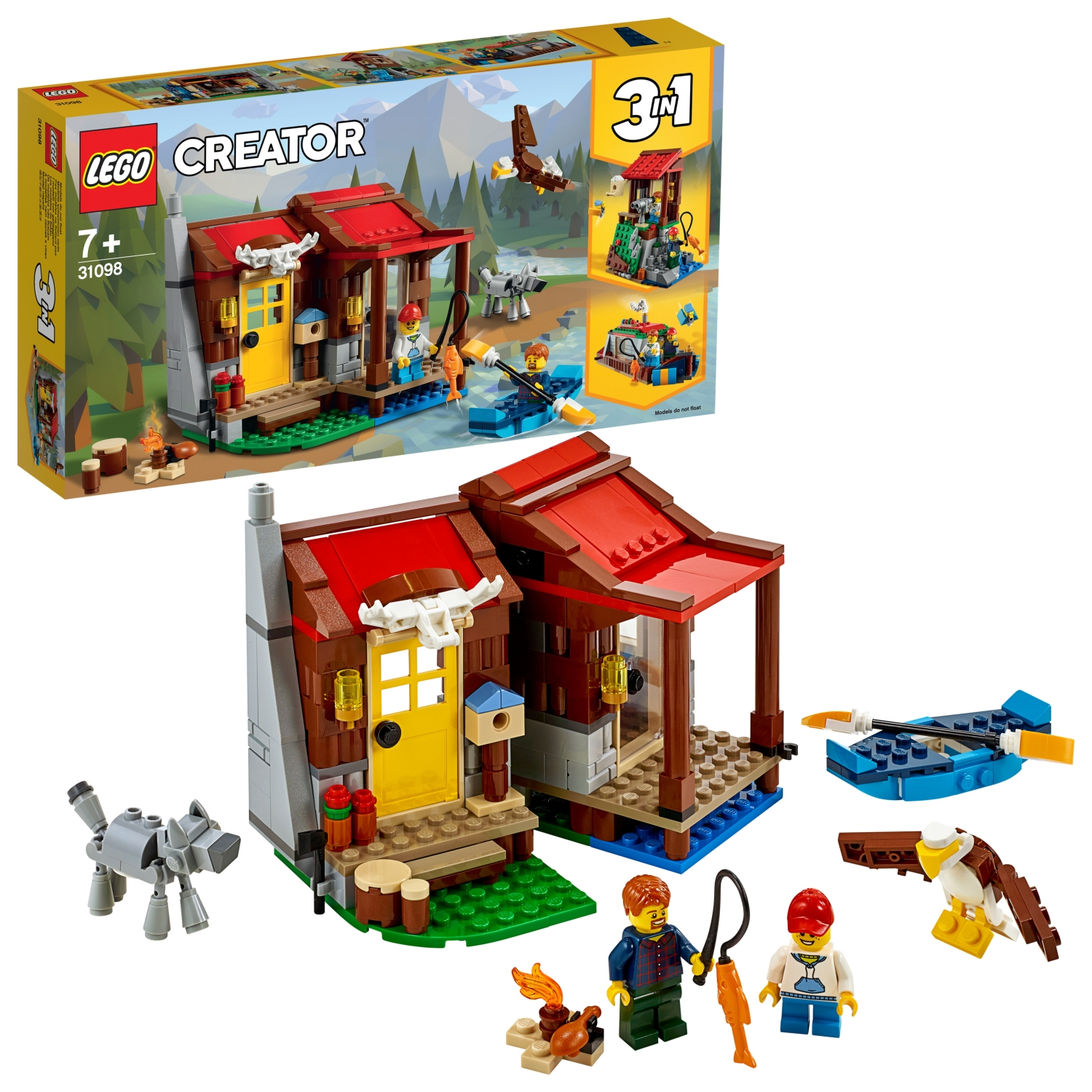 Ensemble Lego Creator cabane. Cabane marron, lac, figurines et boîte avec image de cabane.