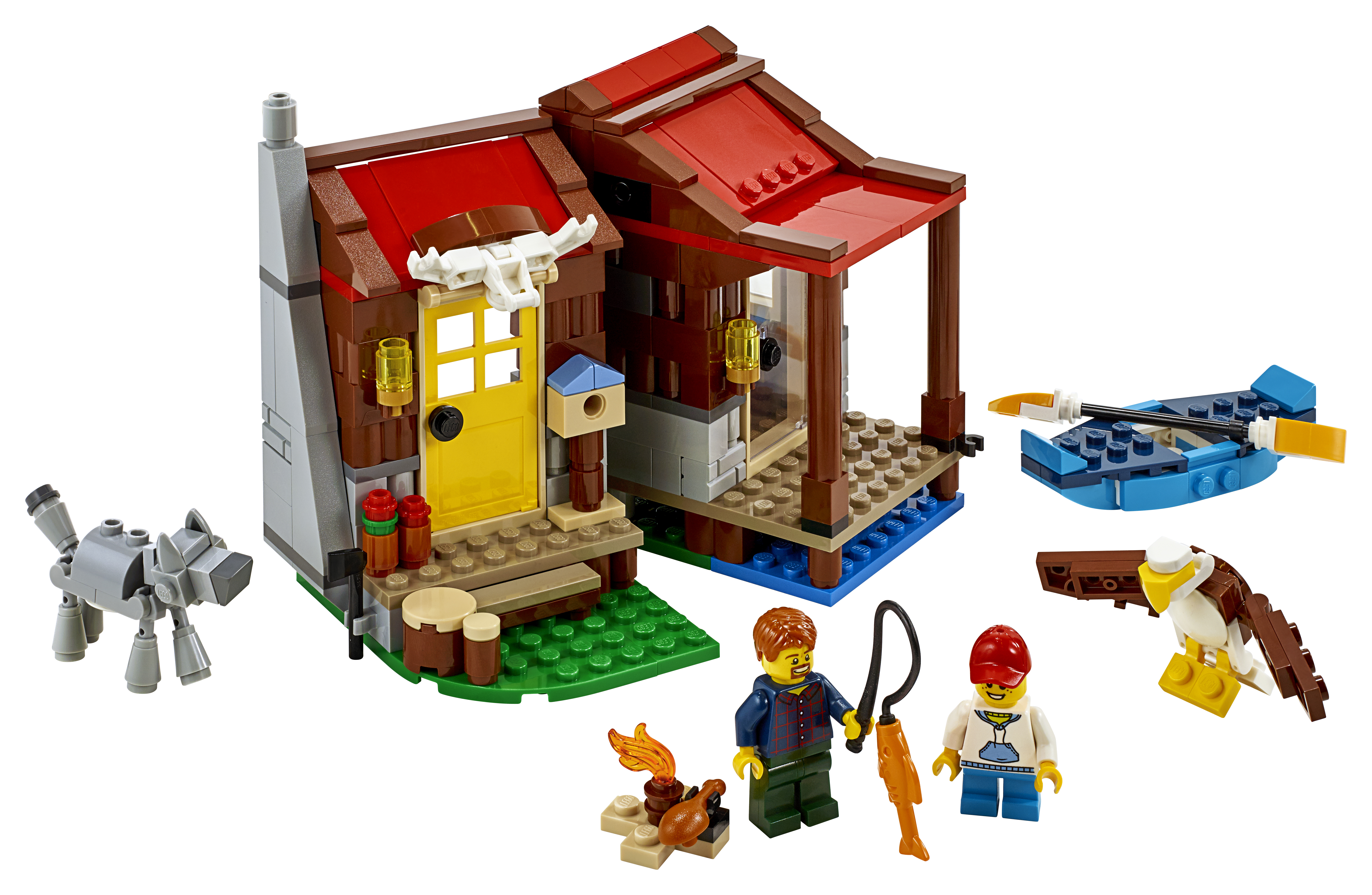 Cabanon Lego avec figurines pêchant et un loup. Comprend un bateau, un feu et une figurine d'aigle.