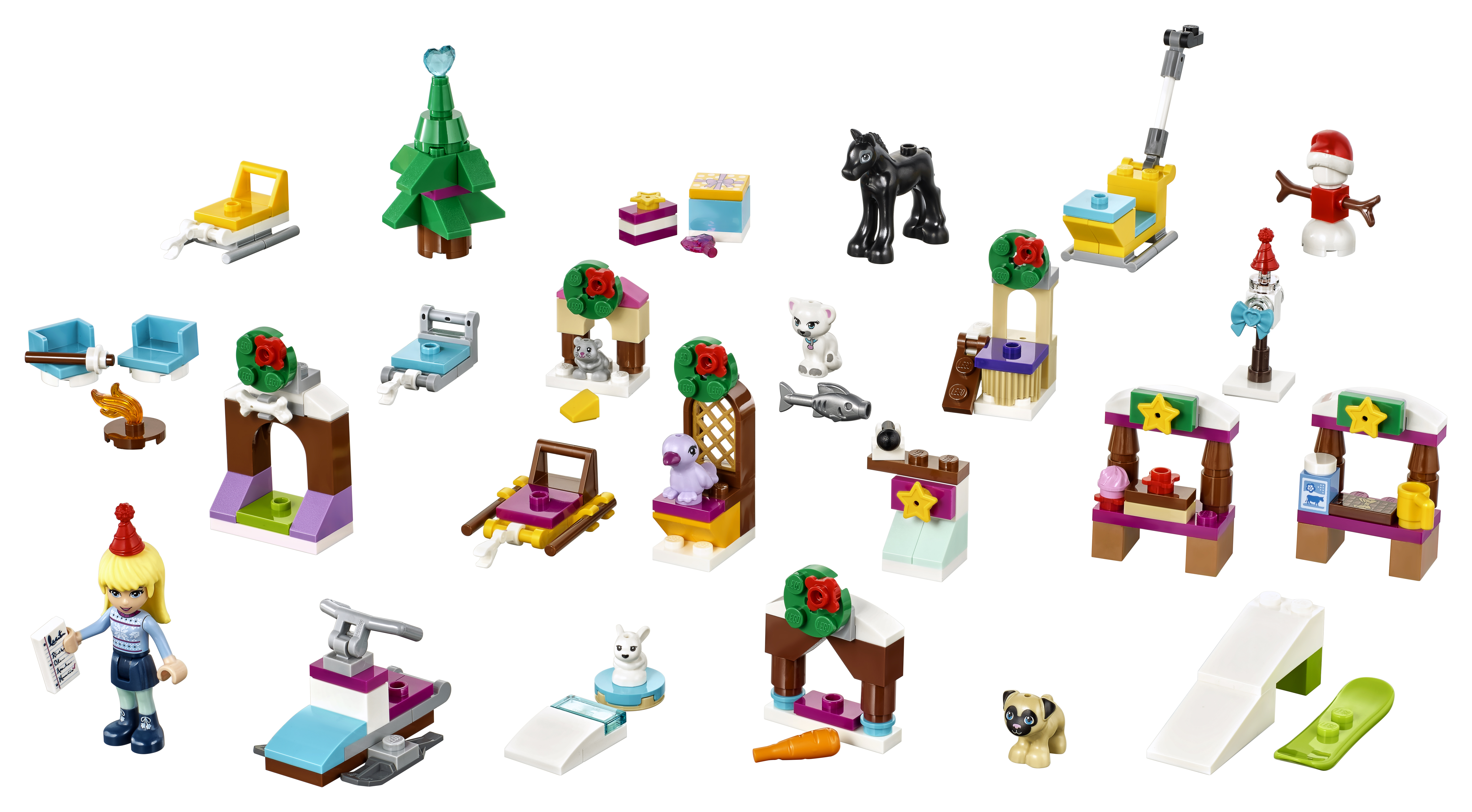 Kalendarz adwentowy Lego Friends z różnymi małymi budowlami i figurkami Lego.