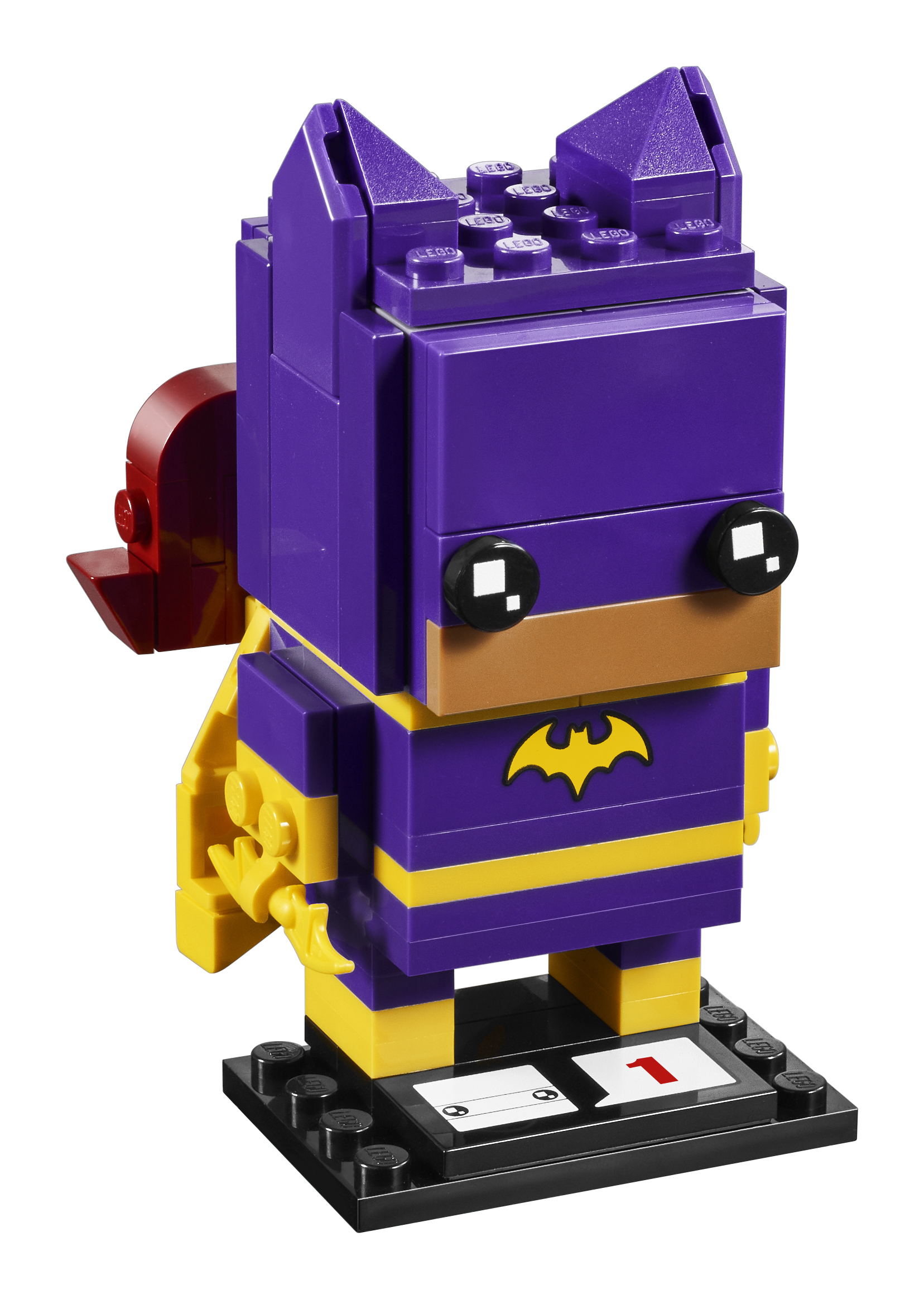 Figurka Lego Batgirl z fioletowo-żółtą kolorystyką. Stoi na czarnej podstawie.
