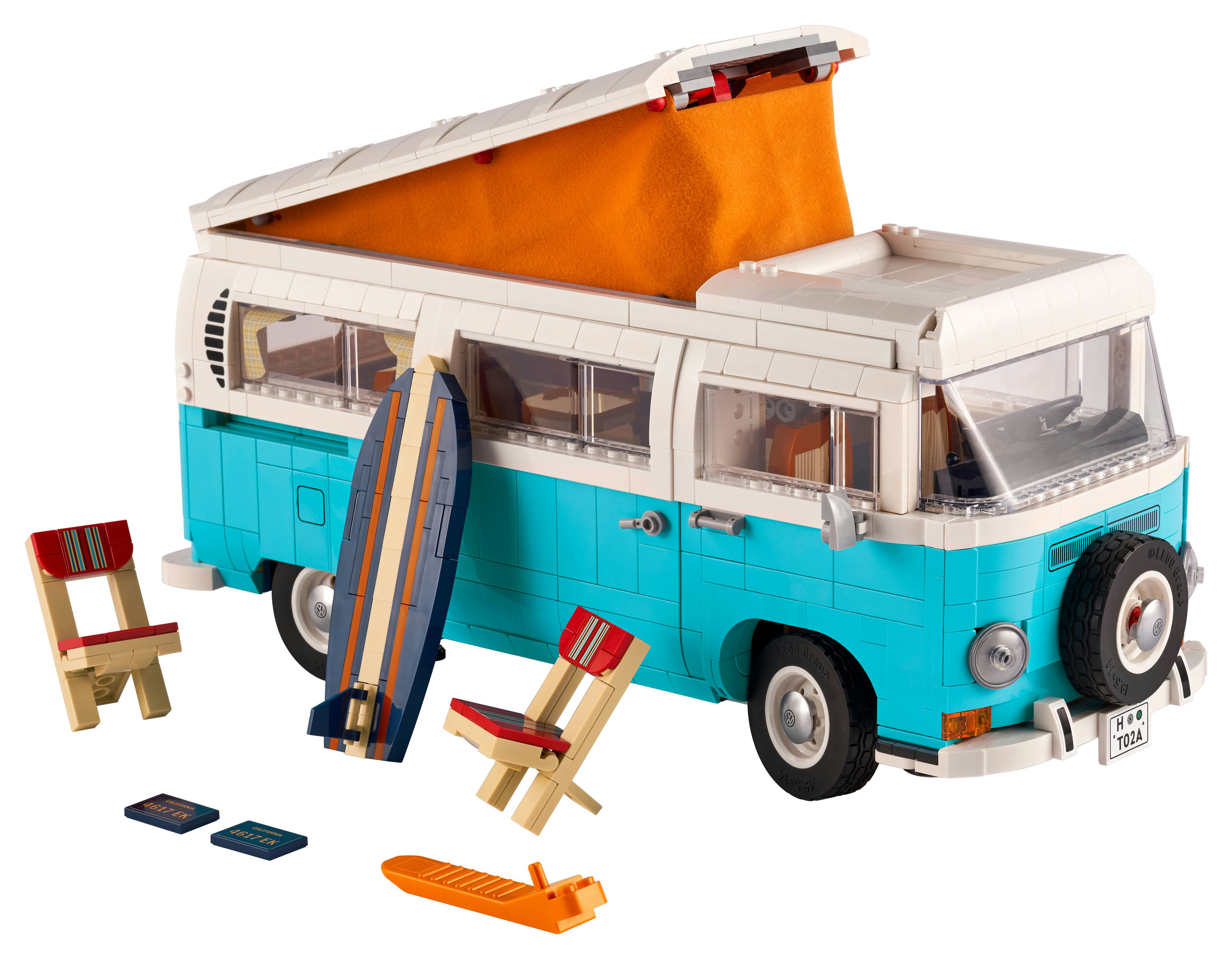 Lego VW camperbusje, blauwgroen en wit, met accessoires.