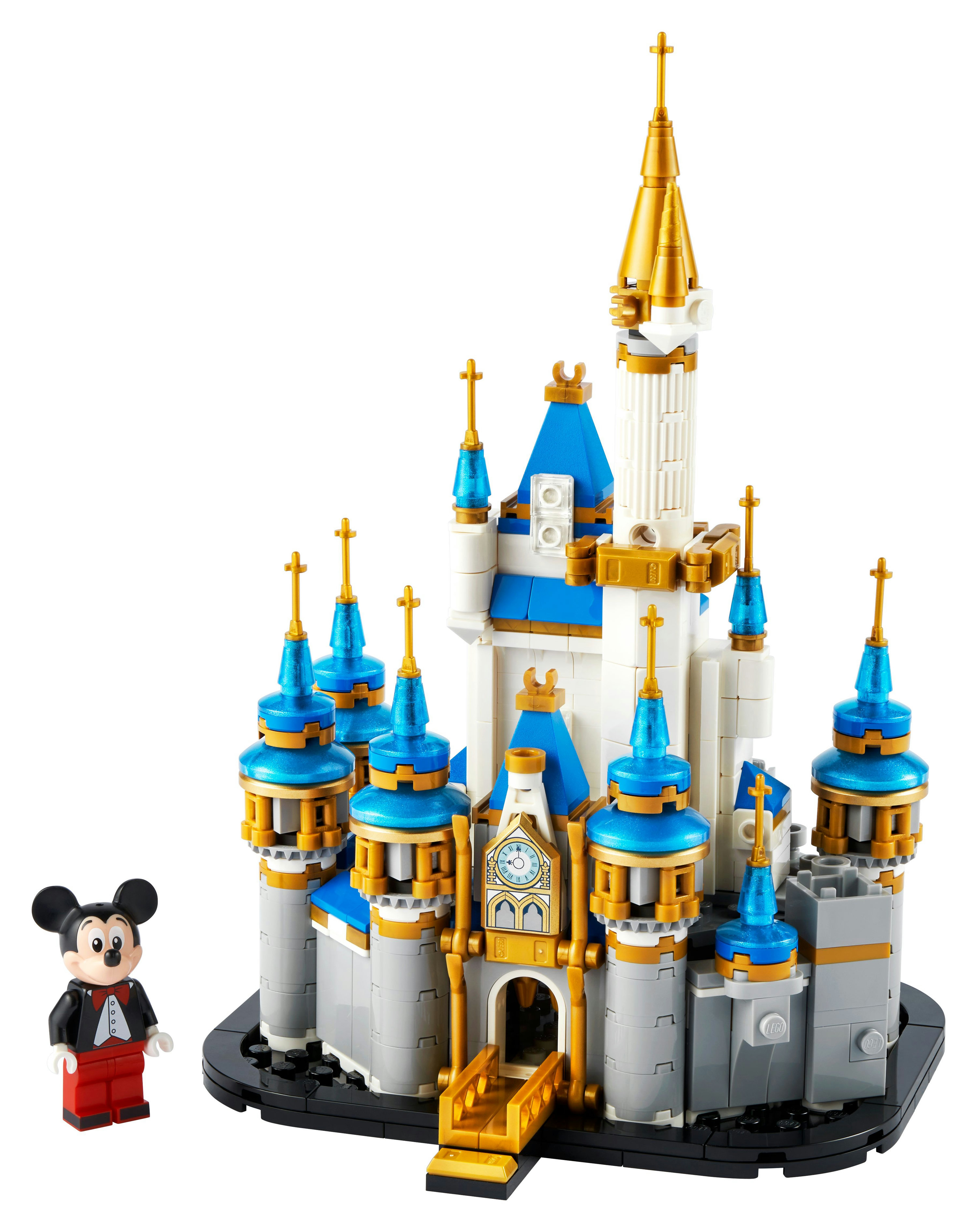 Zestaw Lego Disney z białym zamkiem, minifigurką Myszki Miki i złotymi detalami.