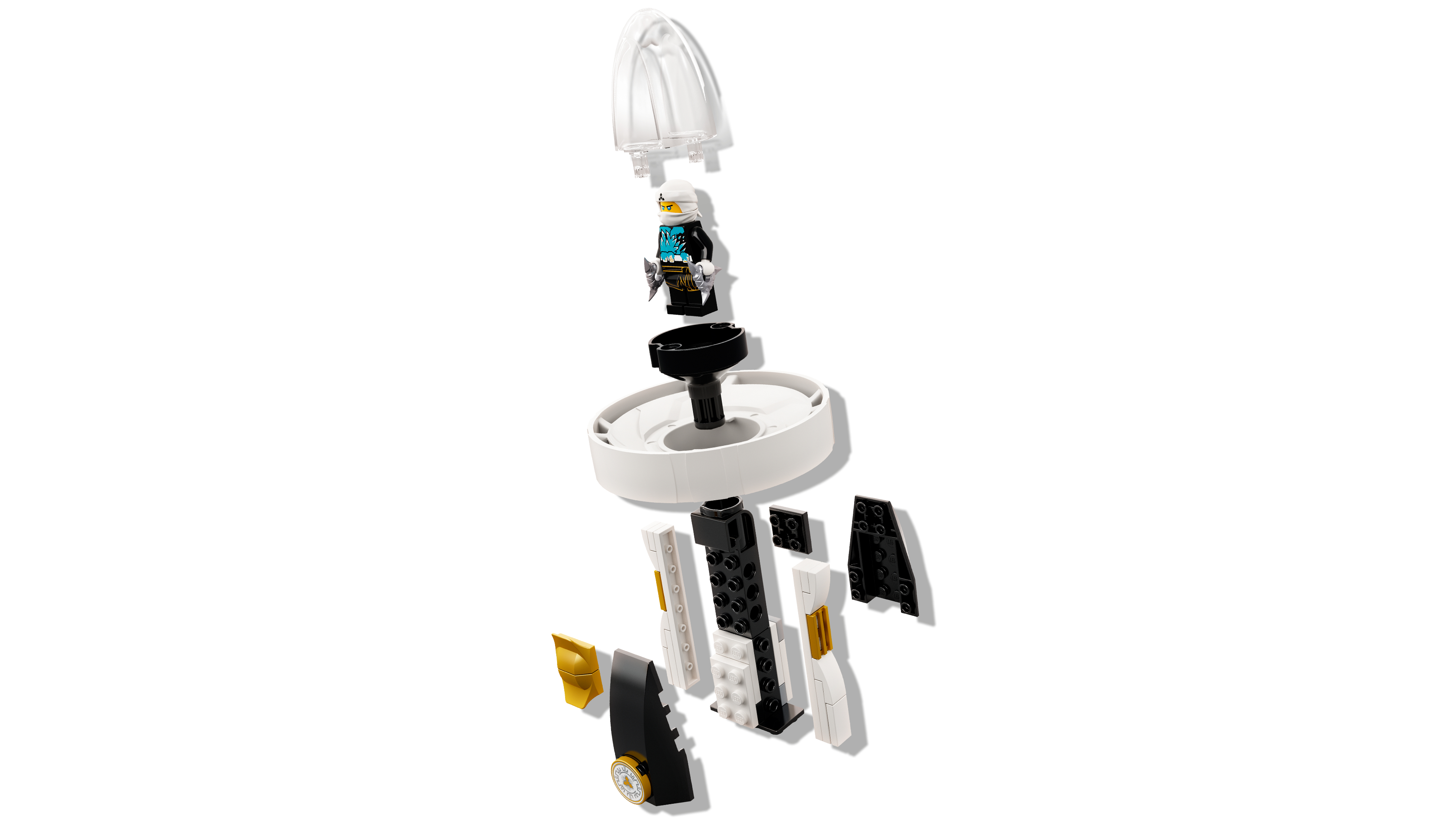 Set LEGO con una minifigure all'interno di una struttura bianca e nera smontata.