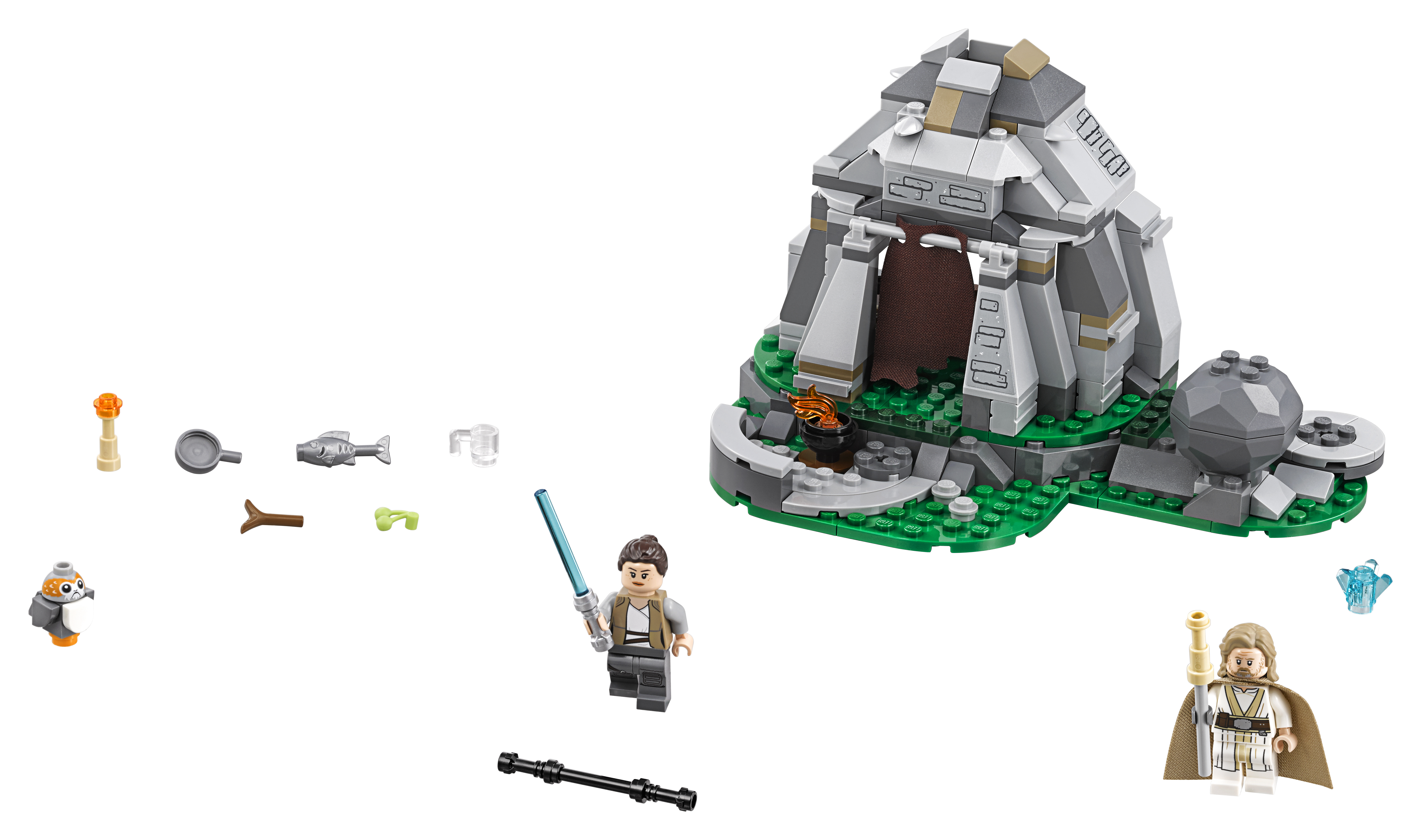 Set Lego Star Wars con un edificio, una figura e accessori su una base verde.