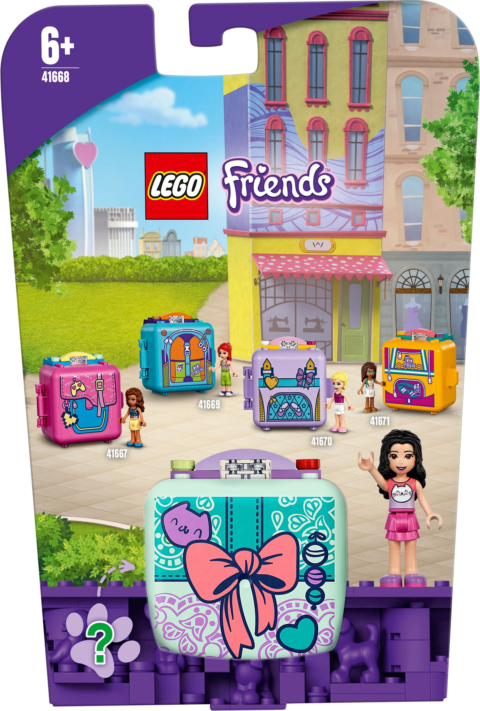 LEGO Friends setdoos, met kleurrijke bouwscène, inclusief minifiguren en diverse koffer-vormige dozen.