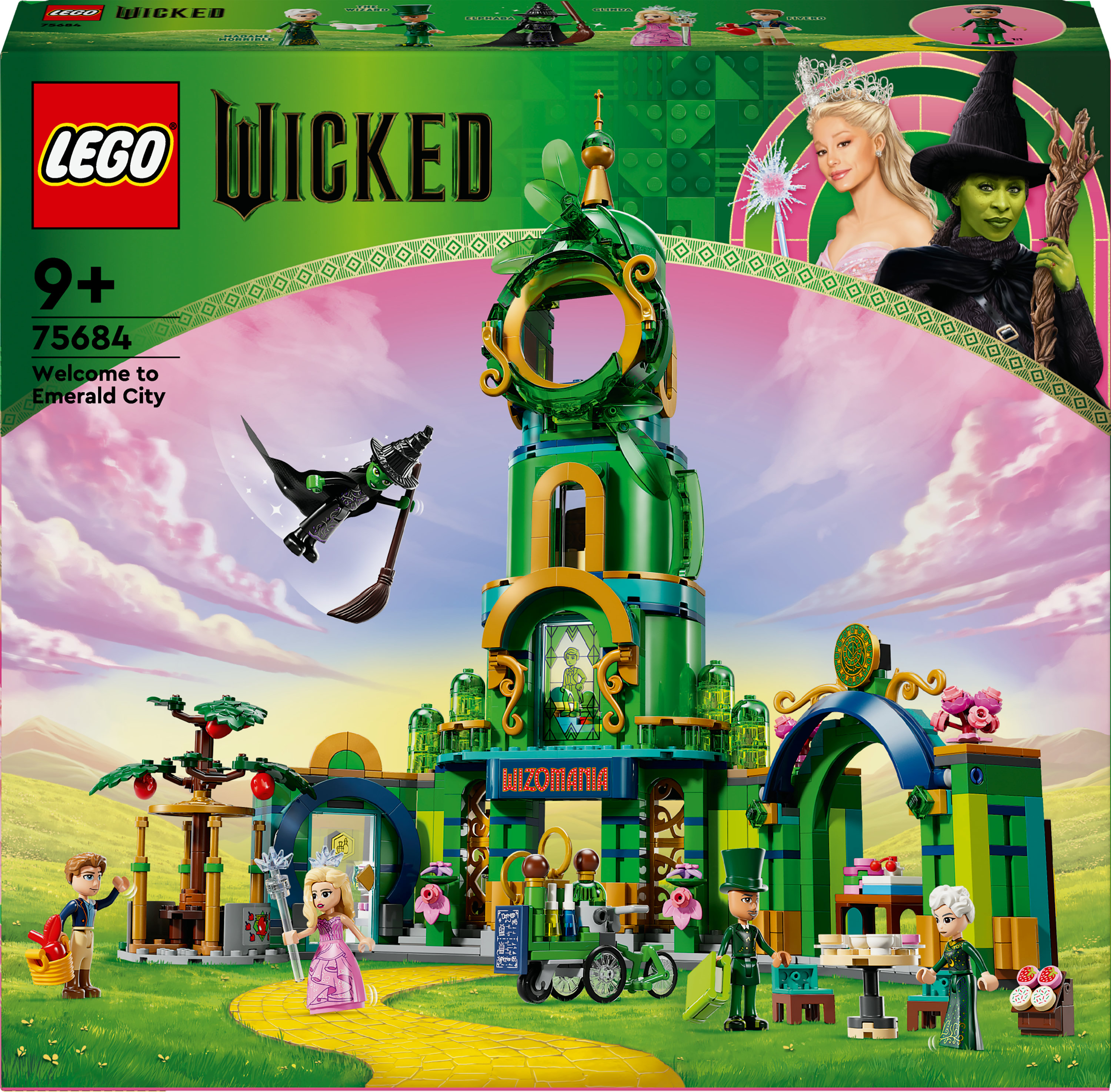 Set de Lego Wicked. Una construcción de Lego con varios personajes, una torre del reloj y un fondo verde.