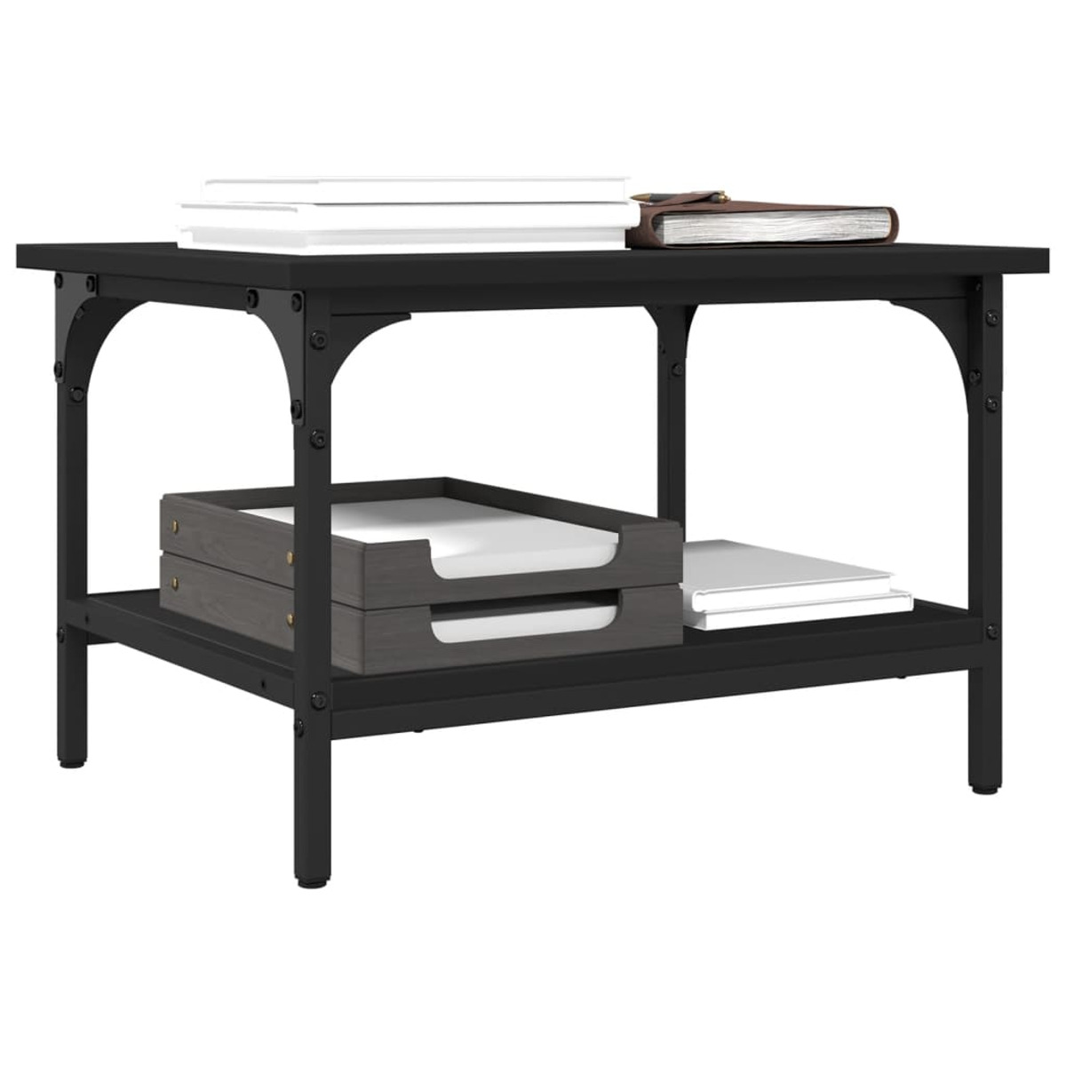Schwarzer quadratischer Tisch mit unterem Regal. Bücher, Papiere und Dekoration sind auf dem Tisch.