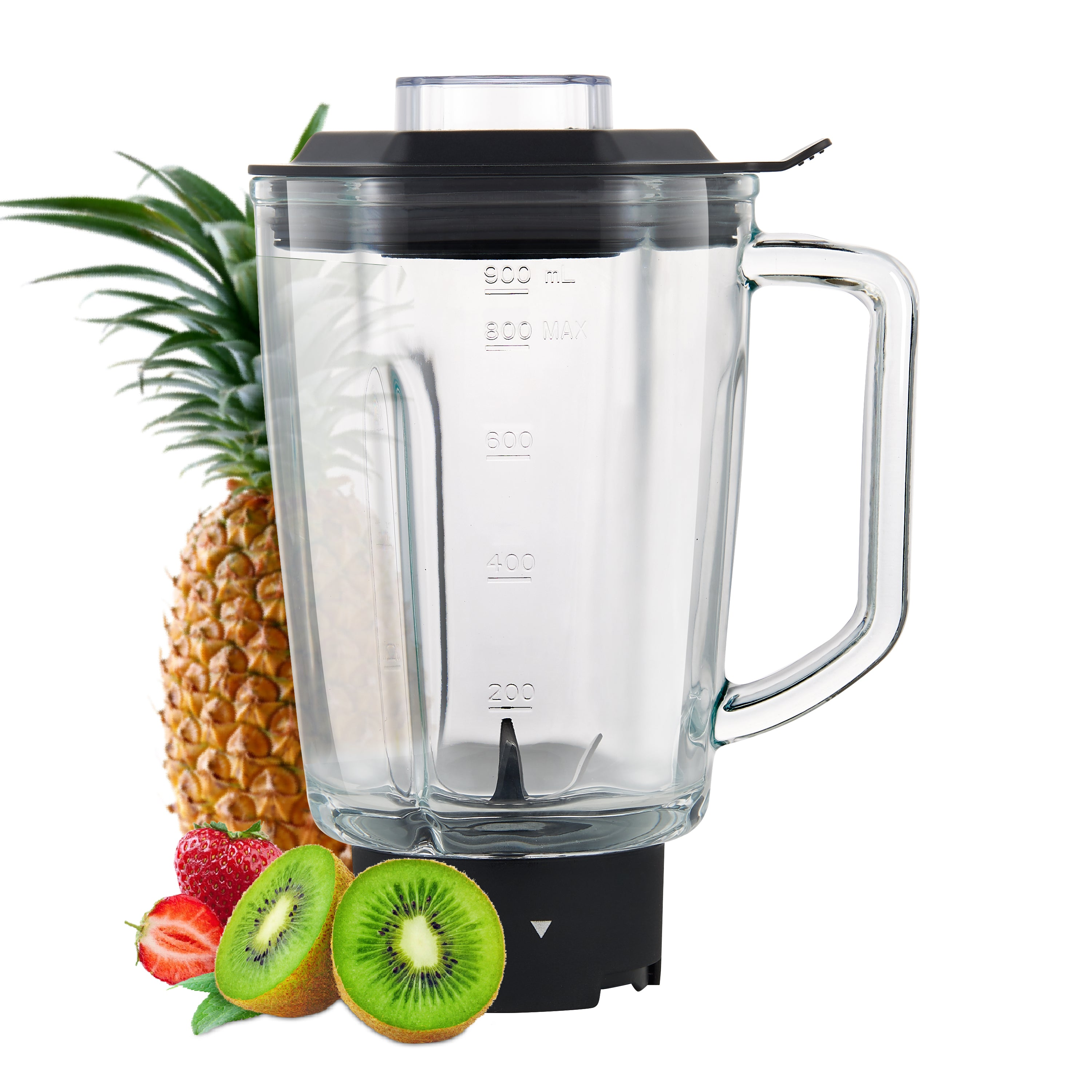 Blender with fruit: pineapple, strawberries, and kiwi. Clear glass jar.
