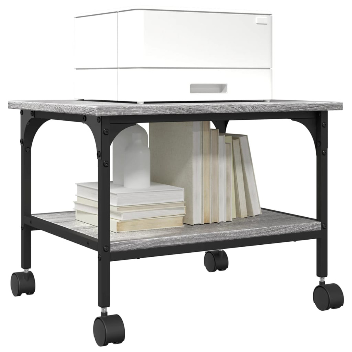 Ein weißer Drucker auf einem Tisch mit Büchern und einem weißen Behälter. Der Tisch ist schwarz mit Rädern.