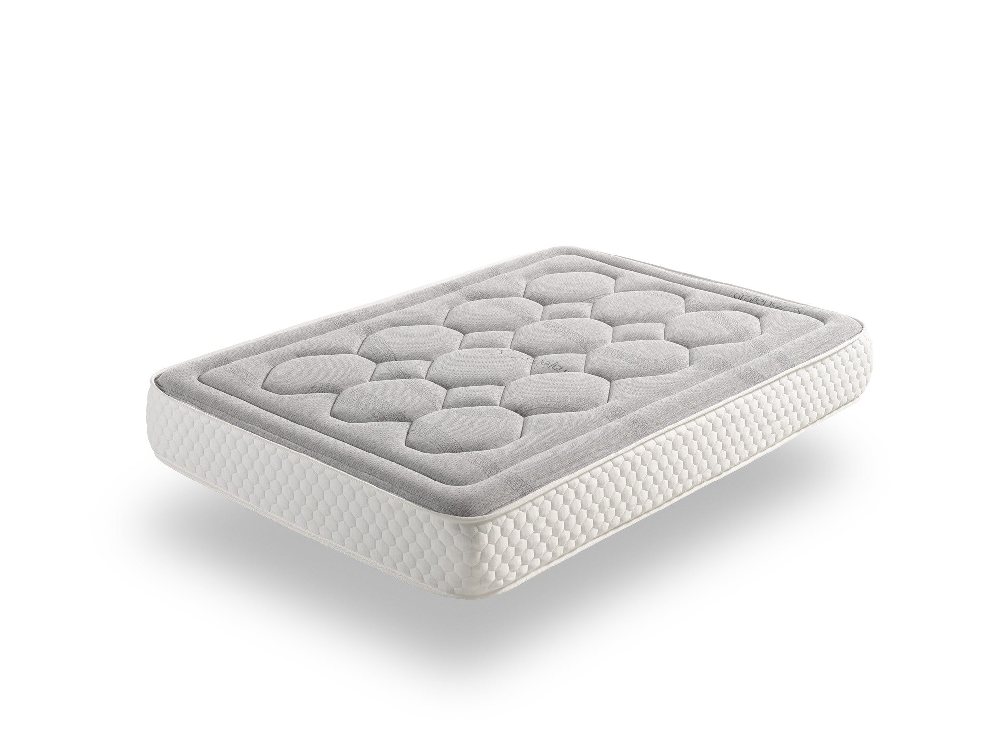 Colchón gris con parte superior estampada y borde blanco, aislado sobre fondo blanco.