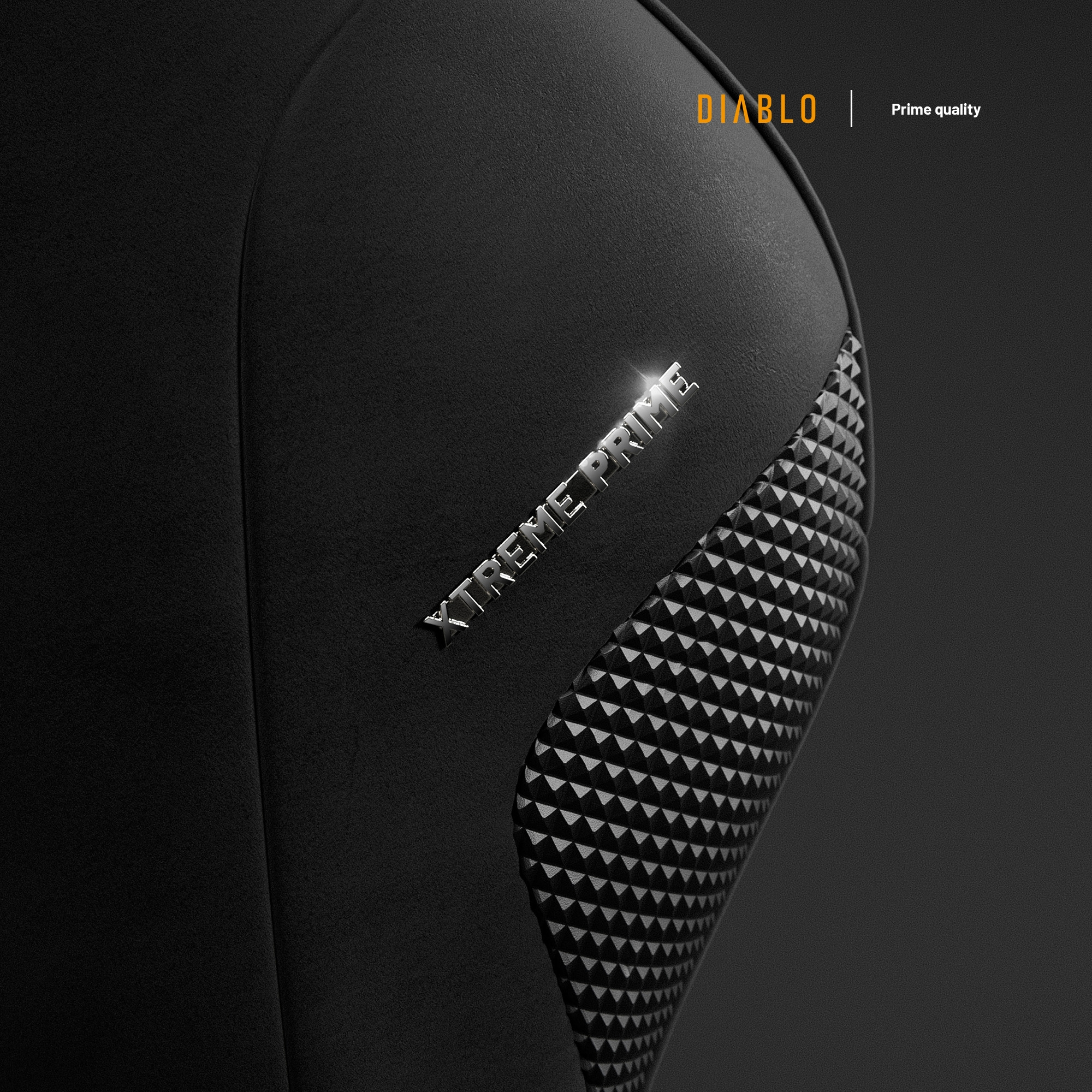 Zbliżenie czarnej tkaniny z tekstem XTREME PRIME i logo Diablo.
