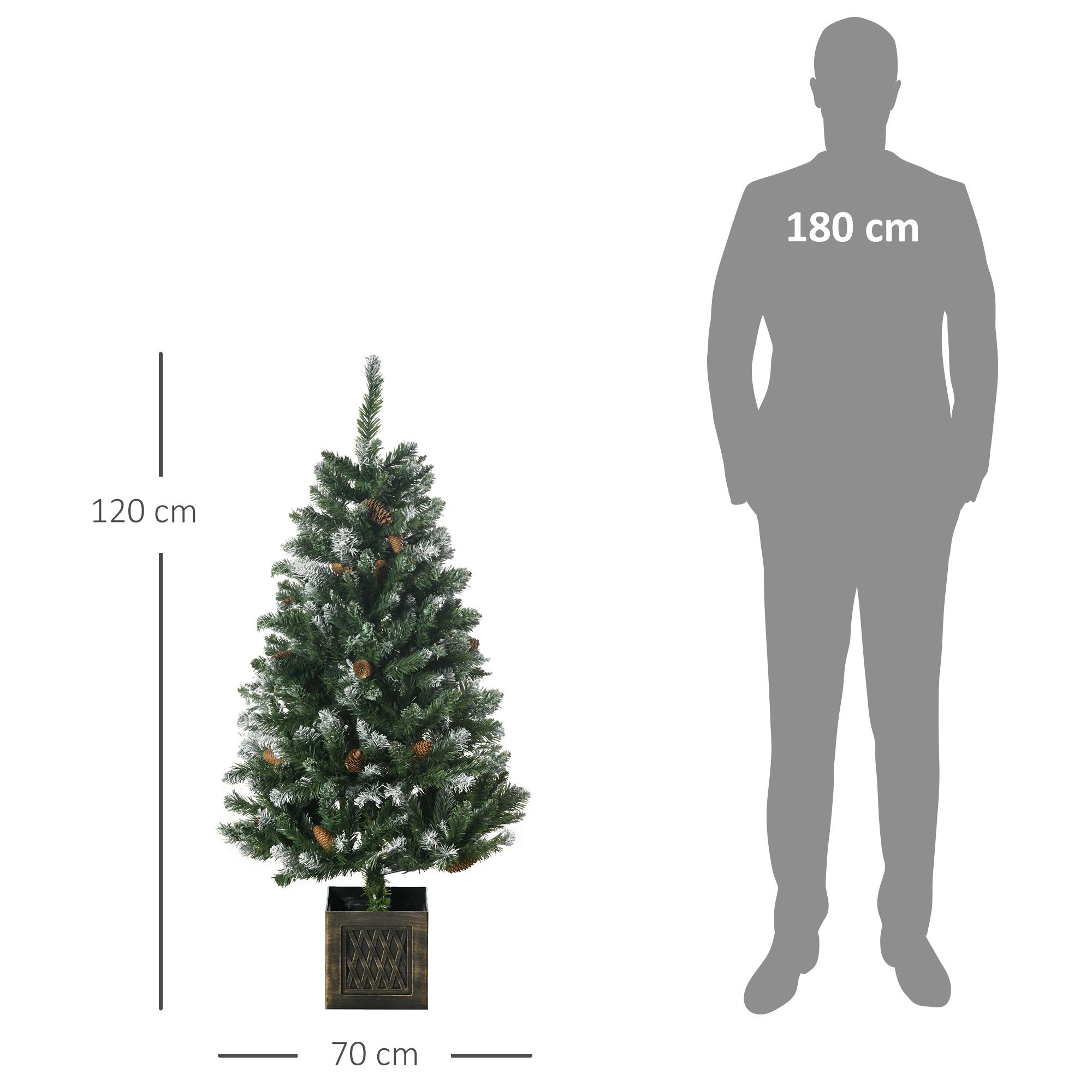 Árbol de Navidad con nieve y silueta de persona al lado.