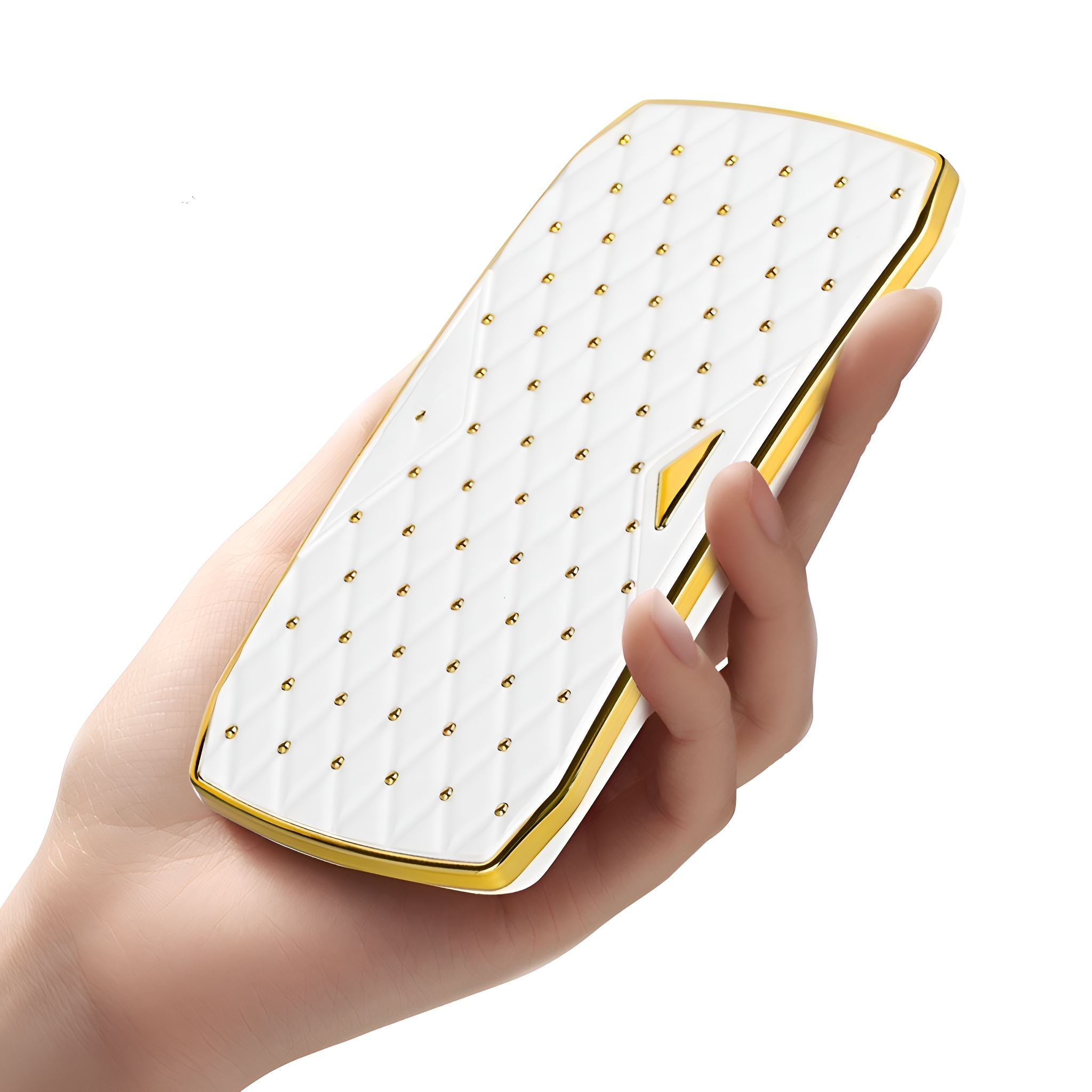 Weißes und goldenes Telefon in einer Hand gehalten.