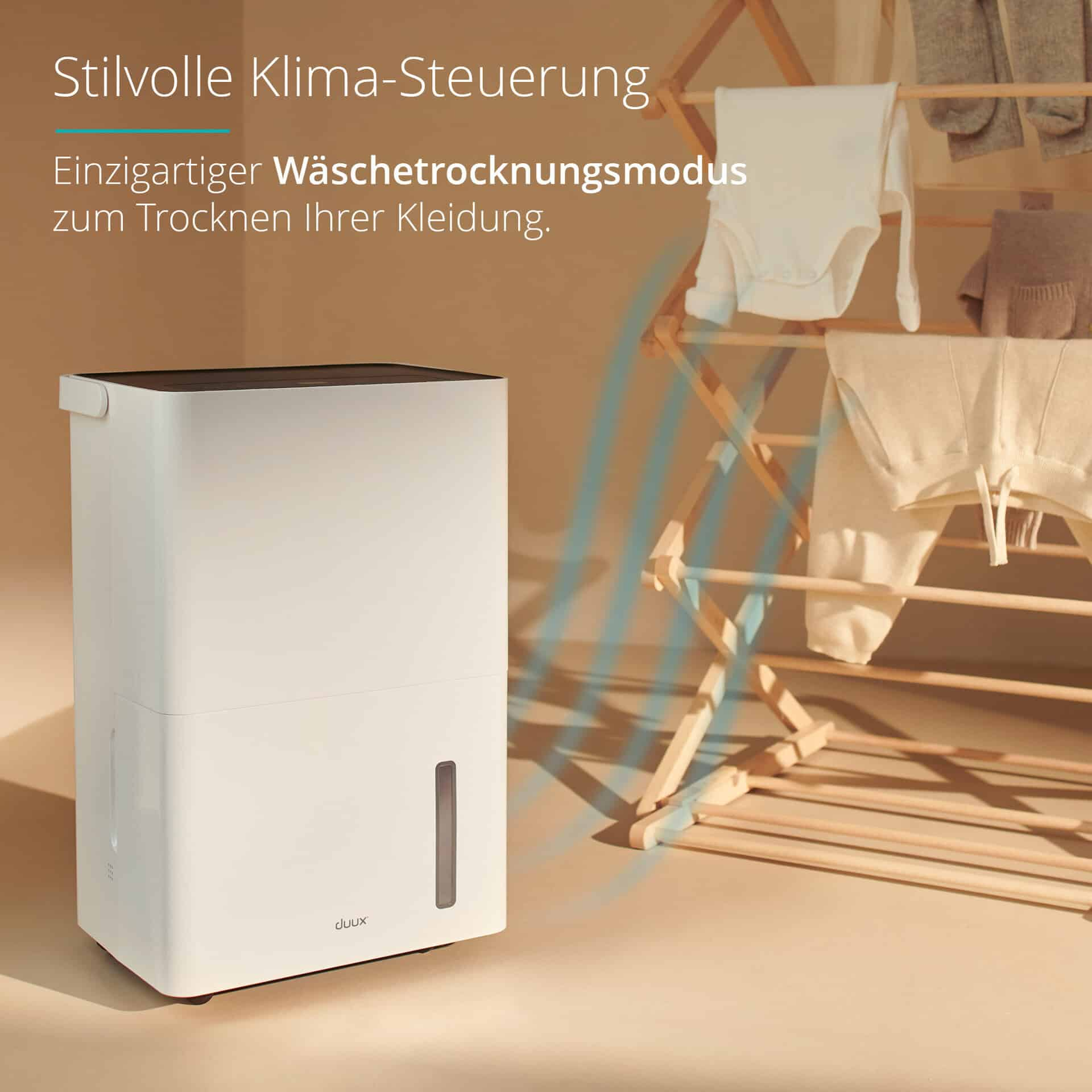 Weißer Luftentfeuchter mit Wäsche auf einem Holzgestell. Text sagt 'Wäschetrocknungsmodus'.