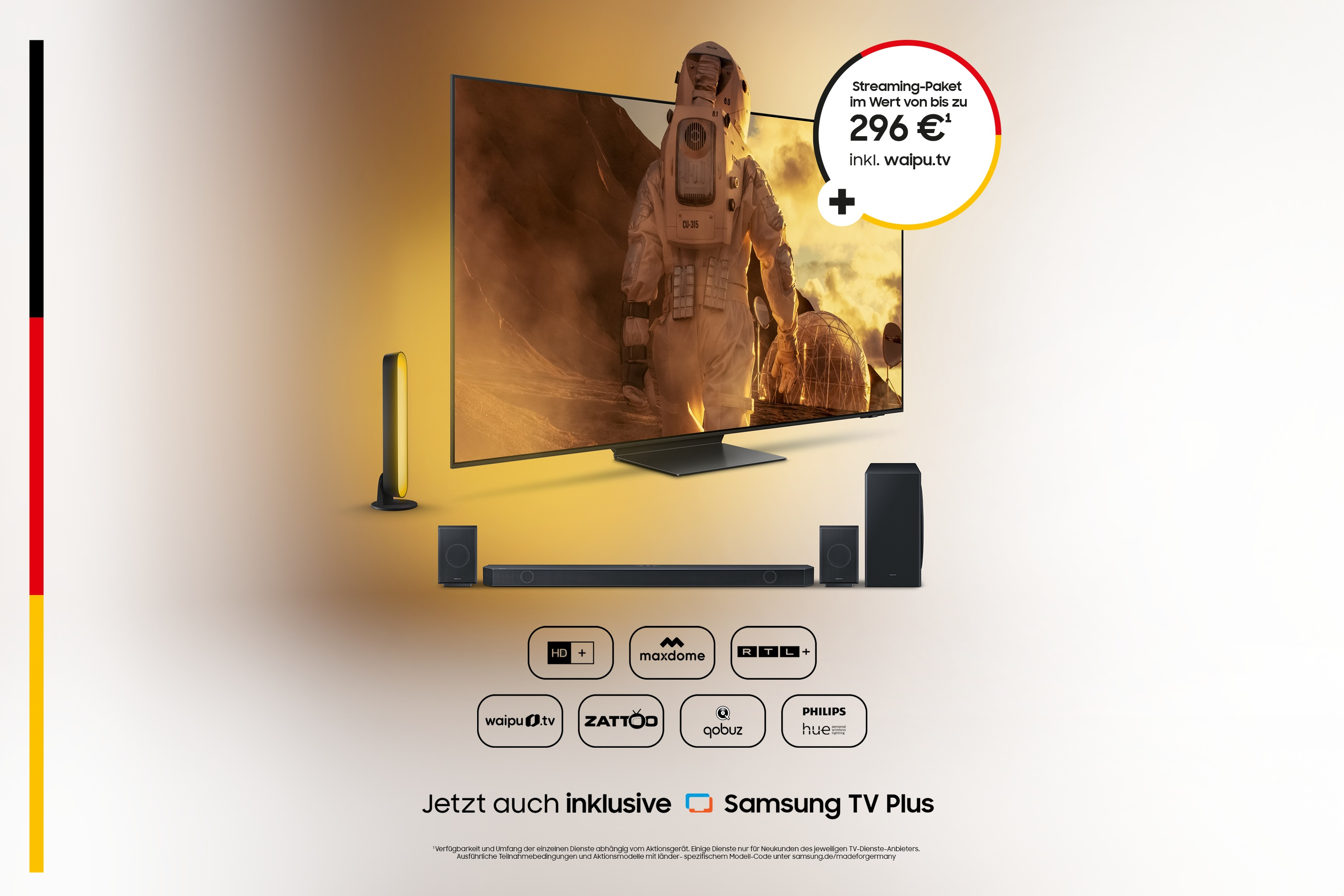 Telewizor z obrazem astronauty, soundbarem i tekstem reklamowym. Telewizor jest głównym elementem.