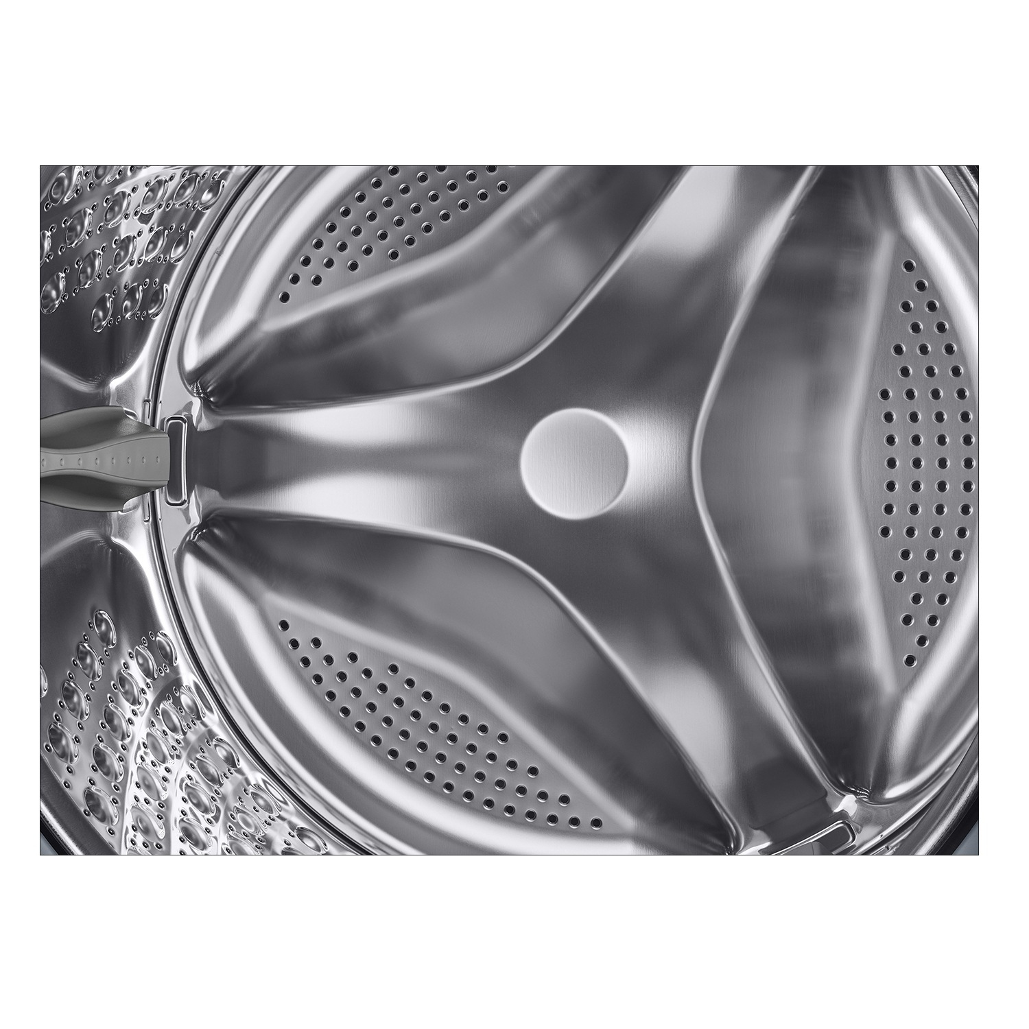 Zbliżenie wnętrza bębna pralki ze stali nierdzewnej. Posiada zakrzywione linie i liczne małe otwory.