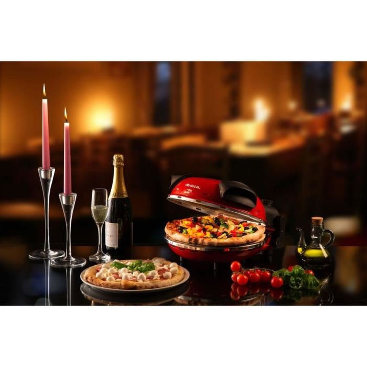 Familie die samen pizza bereidt. Rode pizza-oven op tafel.