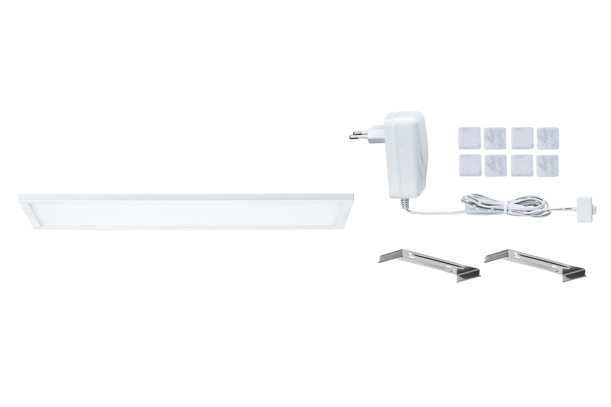 Biały panel LED, zasilacz i wsporniki montażowe na białym tle. Widoczne są kilka podkładek samoprzylepnych.