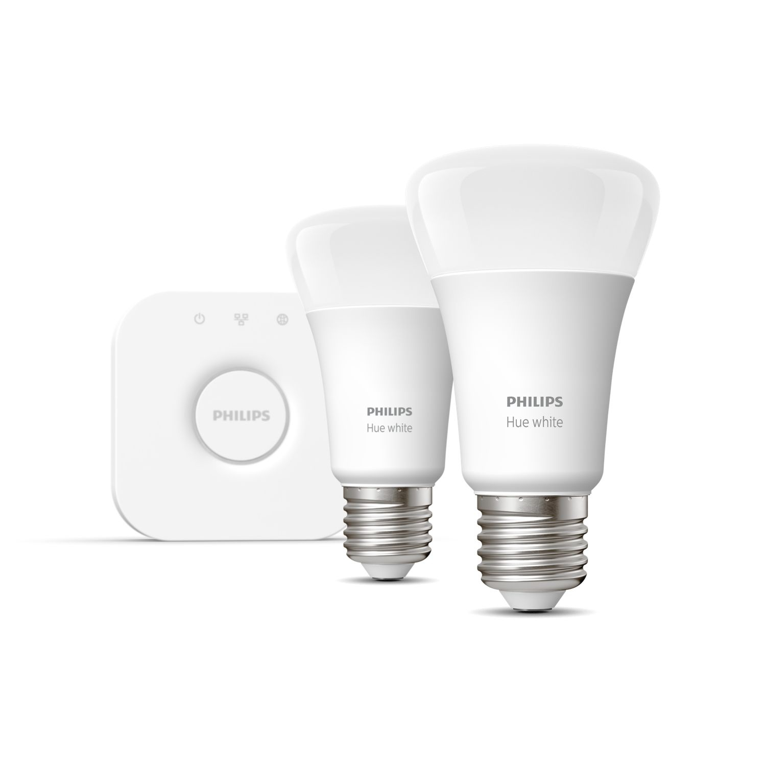 Dwie białe żarówki smart Philips Hue i hub.