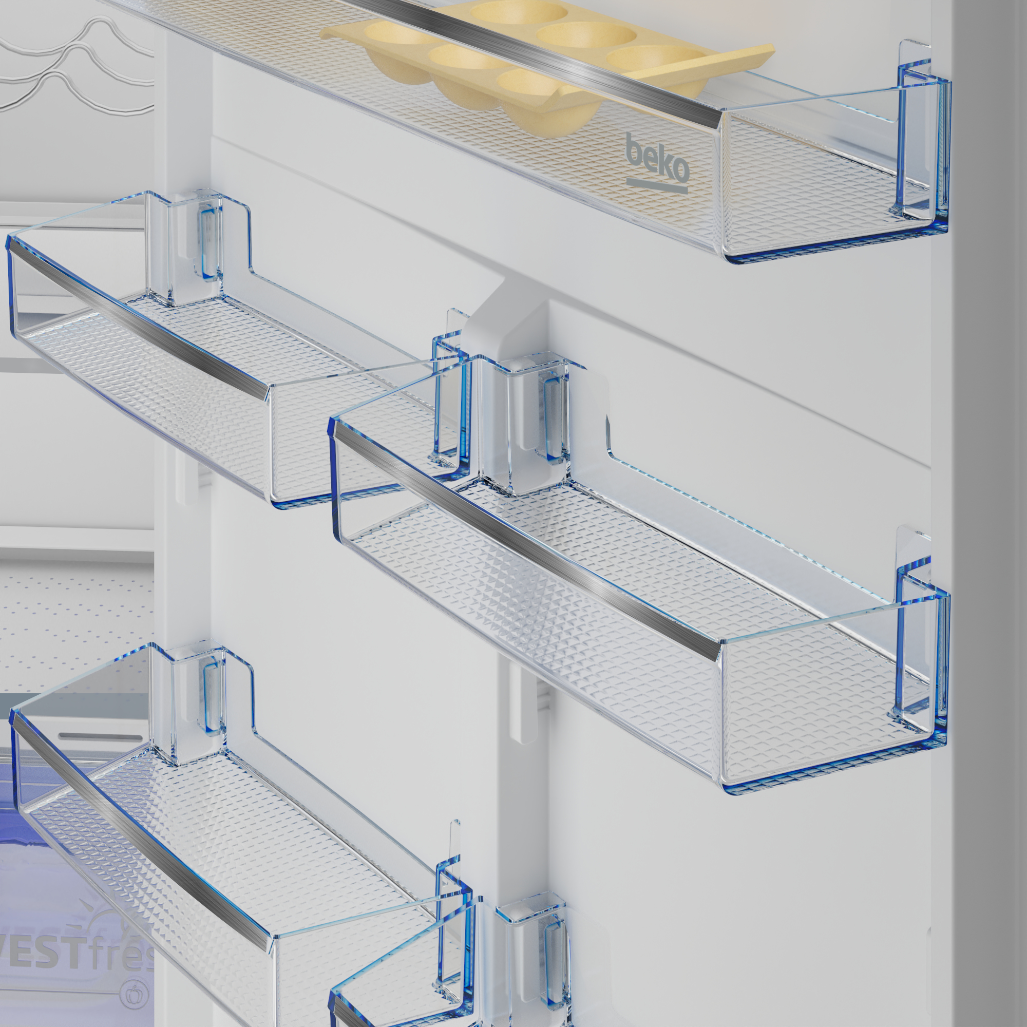 Dentro de un refrigerador Beko. Muestra estantes transparentes y detalles azules sobre blanco.