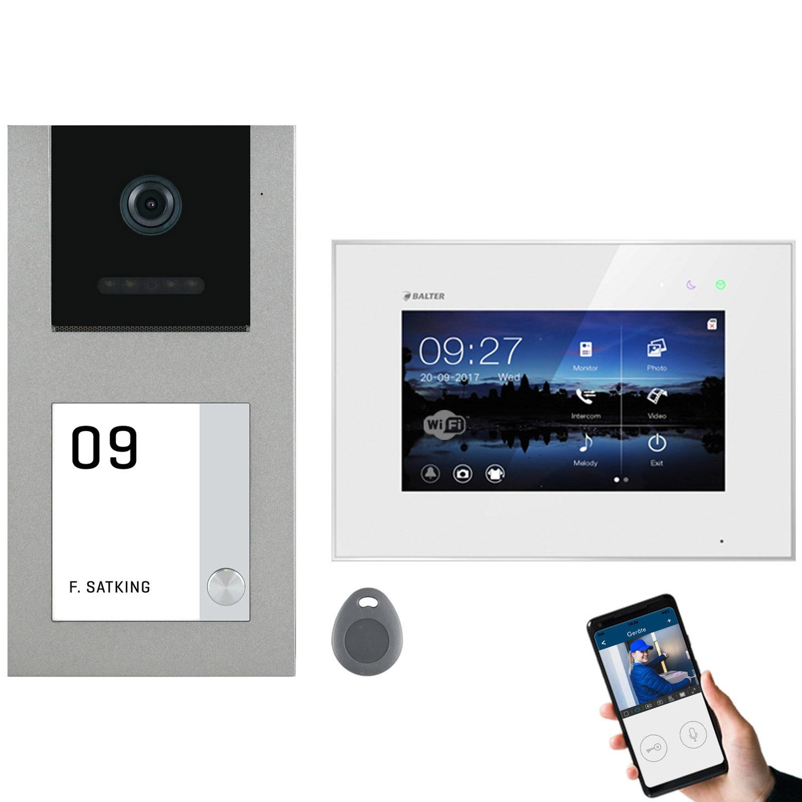 Ein Türsprechanlagen-System mit Kamera, Display und Telefon mit Hand.