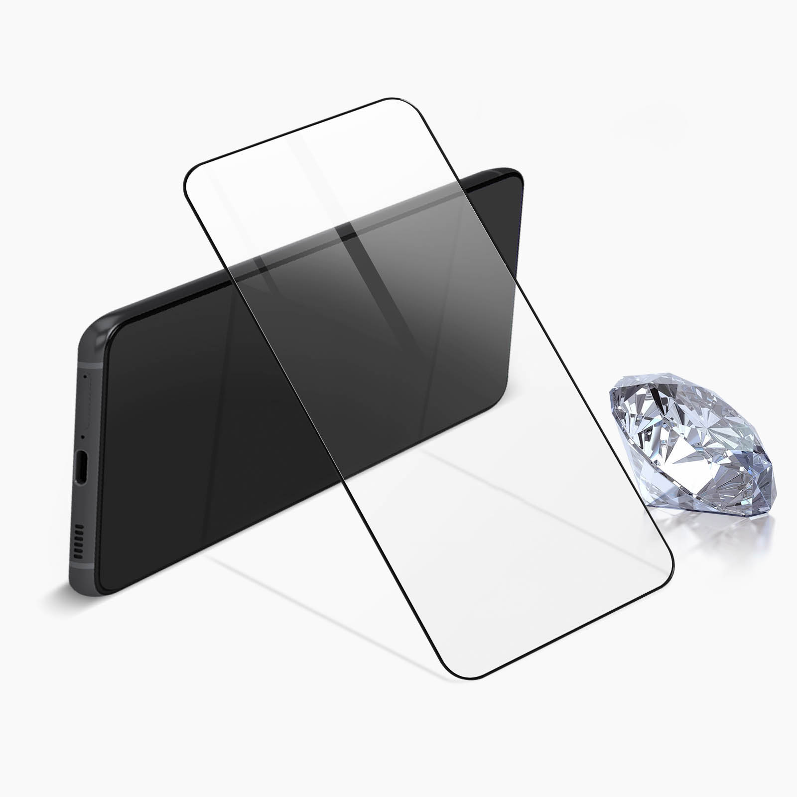 Telefono nero con protezione schermo e un diamante su una superficie bianca.