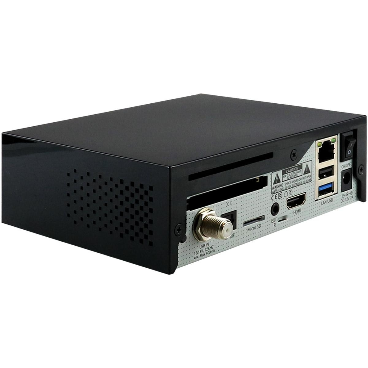Ein schwarzer Digitalreceiver mit mehreren Anschlüssen und Verbindungen auf der Rückseite und Seite.