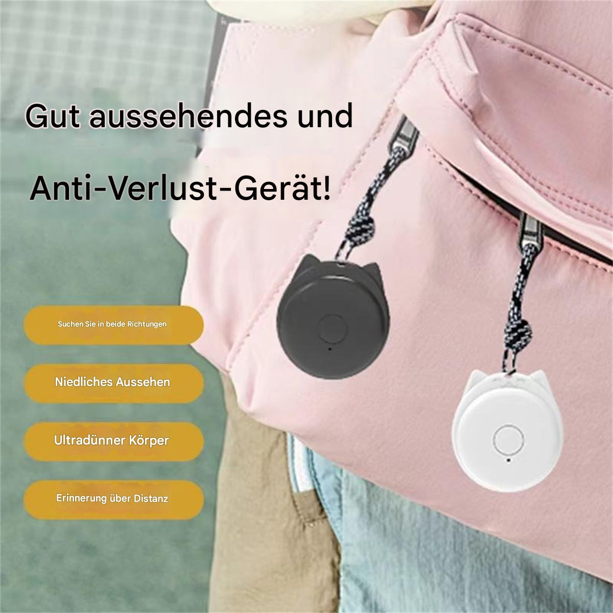 Zwei schwarz-weiße katzenförmige Anti-Verlust-Geräte an einer rosa Tasche. Text: Anti-Verlust-Gerät, niedlich, Abstandserinnerung.
