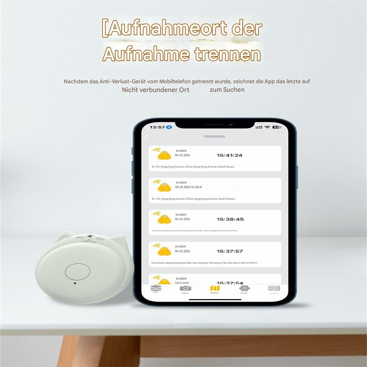 Weißes Ortungsgerät, Telefon zeigt Tracking-Daten auf einem Tisch.