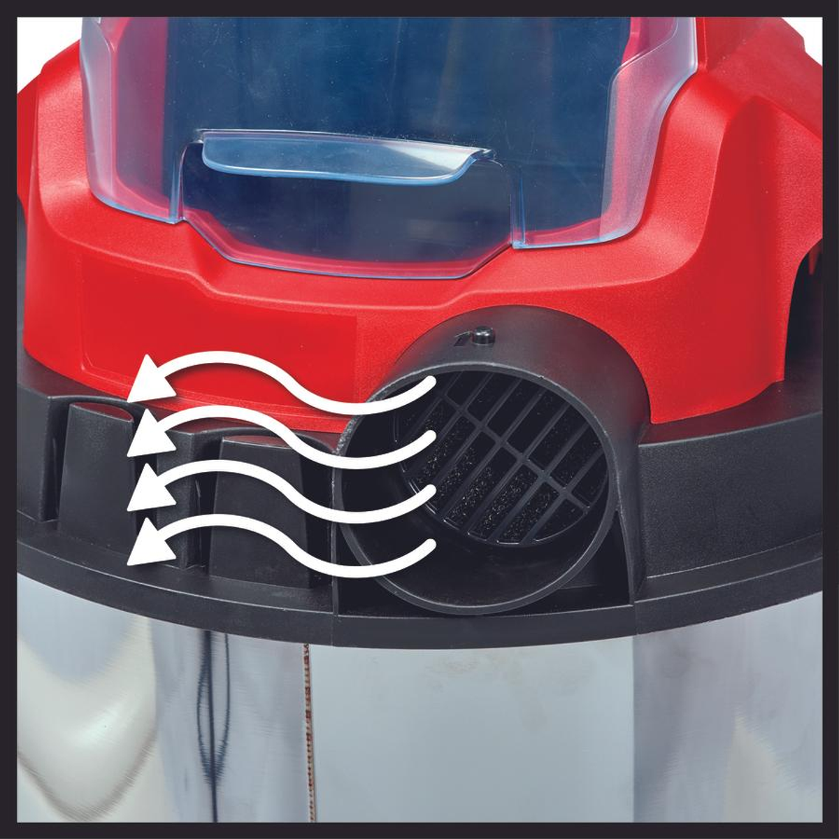 Une vue rapprochée du port d'échappement d'air d'un aspirateur rouge.