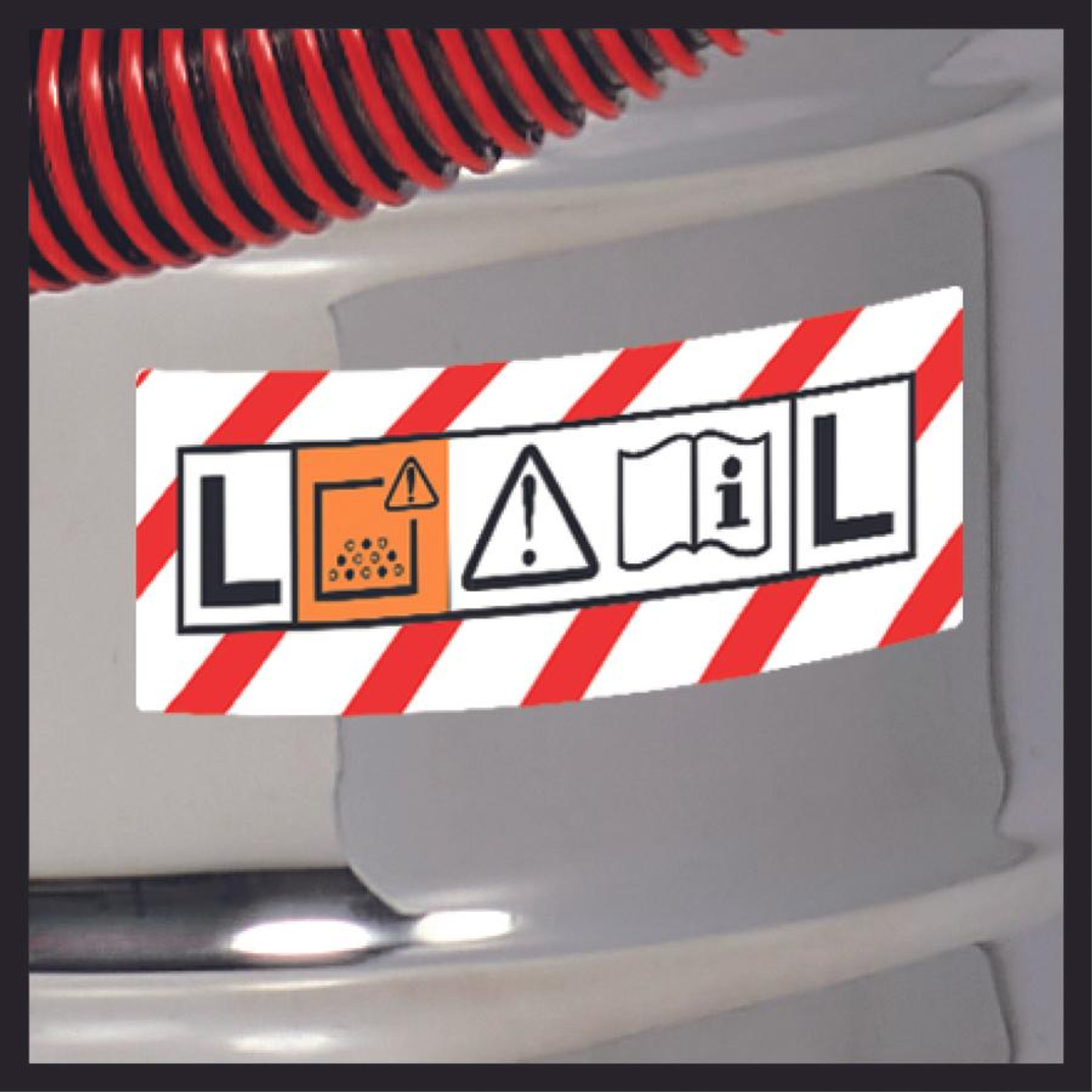 Etykieta ostrzegawcza z symbolami i tekstem: ostrzeżenie, niebezpieczeństwo i przeczytaj instrukcję.