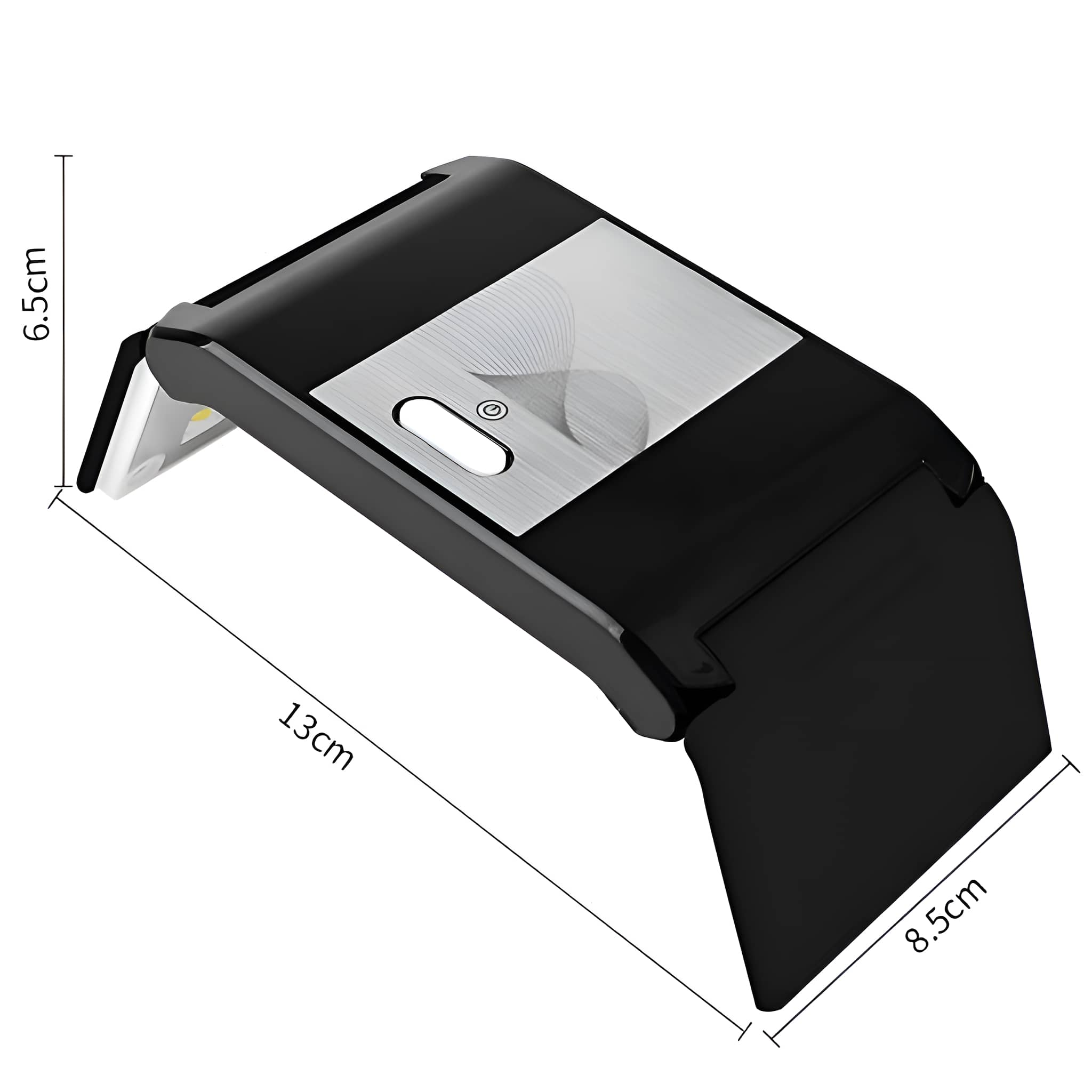 Schwarz-weißes LED-Licht zum Aushärten von Nägeln. Abmessungen: 13 cm lang, 8,5 cm breit und 6,5 cm hoch.