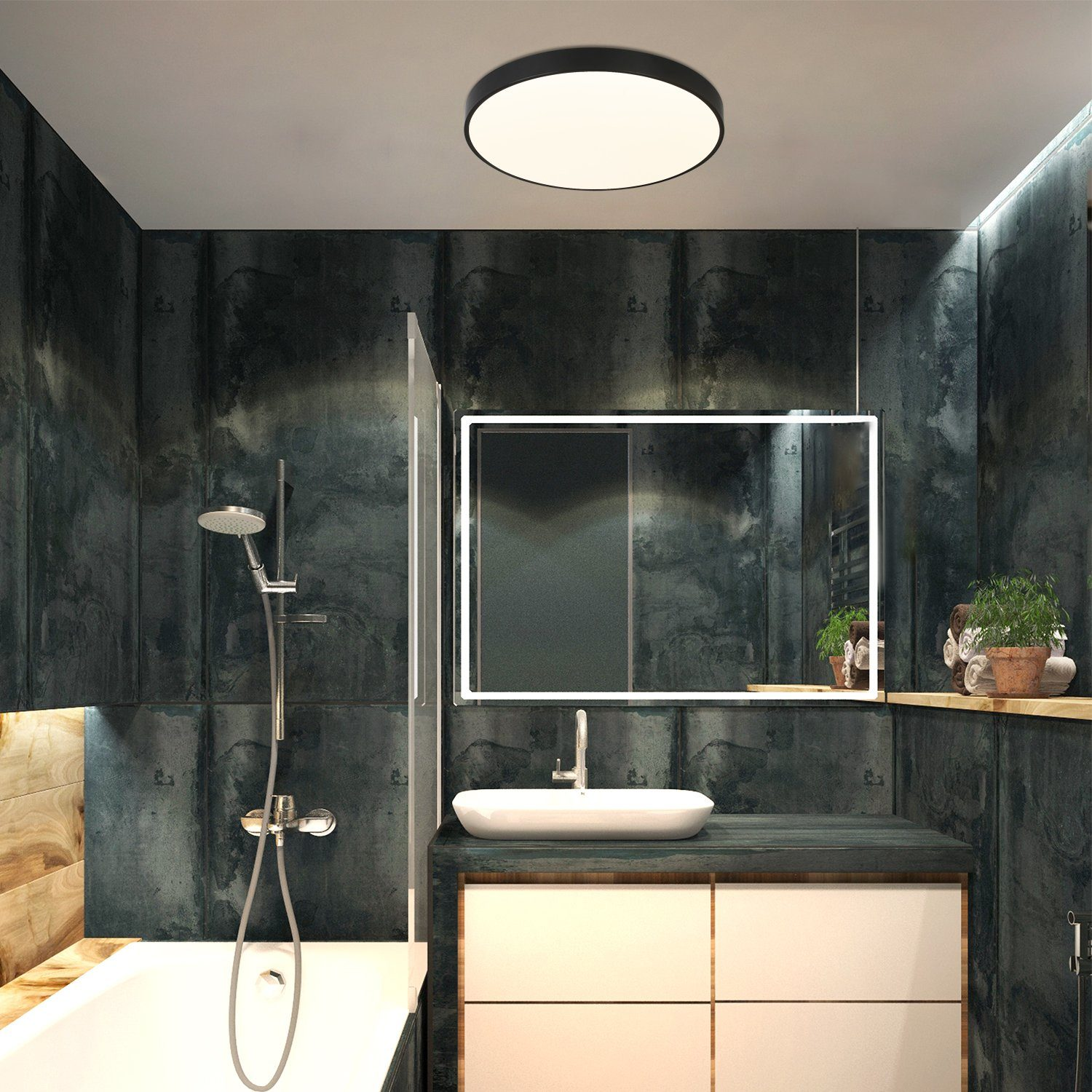 Scena łazienkowa. Jest lustro, umywalka, wanna i prysznic. Ściany są ciemne.